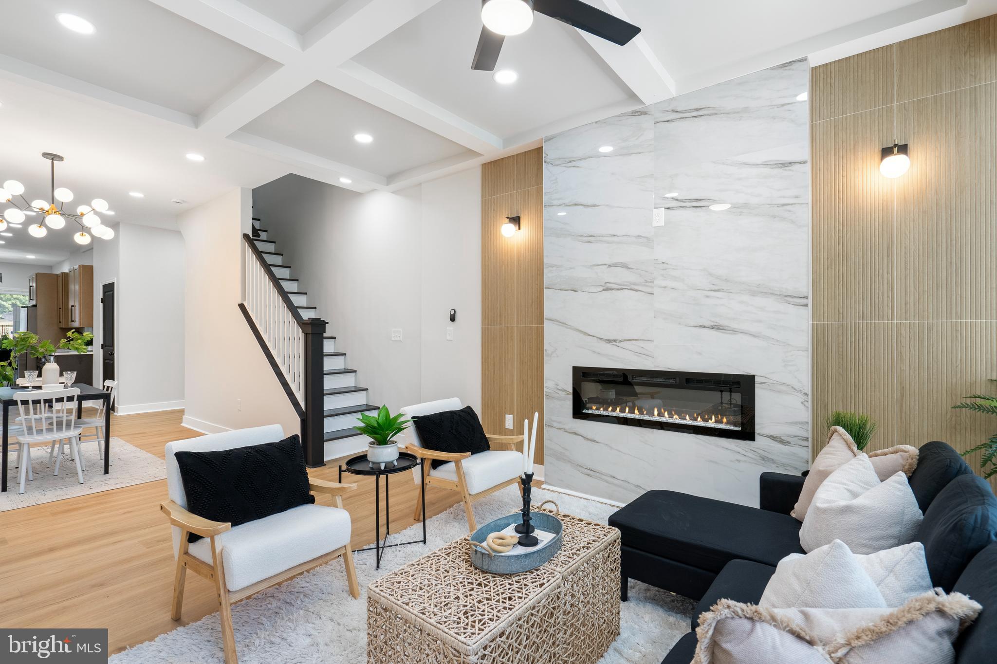 Located in the highly sought-after Reservoir Hill neighborhood, this stunning Victorian-style home beautifully blends timeless charm with modern luxury. Offering over 3,200 square feet of elegant living space, this 4-bedroom, 4.5-bath residence features a striking front façade that captures classic architectural character while providing every contemporary comfort. Step inside to find soaring ceilings, abundant natural light, and an open-concept layout that flows seamlessly through spacious living and dining areas—perfect for entertaining or relaxing with family. The chef’s kitchen impresses with premium stainless-steel appliances, custom cabinetry, a large center island, and stone countertops, creating both style and functionality. The luxurious primary suite serves as a private retreat, complete with a spa-inspired en-suite bathroom featuring dual vanities, a soaking tub, and a walk-in shower. Each additional bedroom offers generous space and its own access to beautifully designed bathrooms, ensuring comfort for everyone. Outside, enjoy a fully fenced backyard ideal for gatherings, gardening, or unwinding in privacy, along with ample 3-car parking. Just a short walk from the newly revitalized Druid Hill Park, this exquisite home offers a rare opportunity to enjoy historic charm, modern sophistication, and one of Baltimore’s most desirable locations—all in one remarkable property.