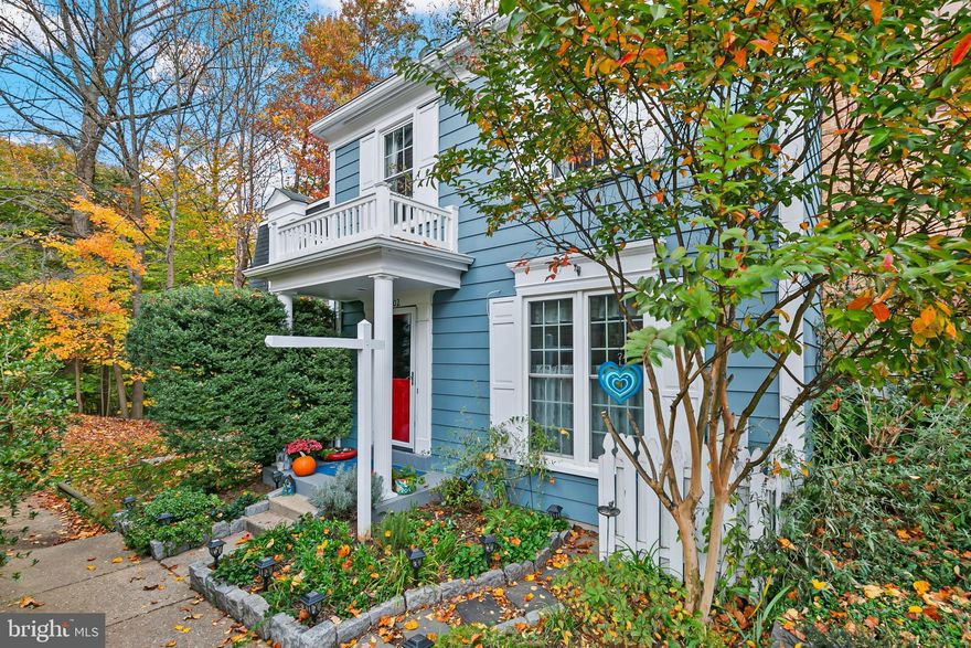 Here is your chance to own a beautiful 3 bedroom, 2.5 bath townhome in the corner of a quiet cul-de-sac in the coveted Dumont Oaks community. Backing to an incredible view of protected parkland which connects to the Rachel Carson Greenway, this home offers peaceful, natural views you'll love all year long. The recently painted exterior is the first glimpse into the great spaces and updates you'll find within the home. Just inside you'll find a stylish tiled floor in the entryway along with a convenient updated powder room. The tile leads to a bright, updated kitchen with granite countertops, stainless steel appliances including the gas stove, and a subway tile backsplash. There is a walkthrough to the dining area which features some of the real hardwood floors you'll find in the home. Painted in designer colors which you will encounter throughout the home, this area is open to a comfortable, airy living room which has a walkout to the rear deck with an amazing view of the parkland behind the home. Upstairs are more real hardwood floors throughout and three bedrooms which includes an owner's suite with a private bathroom which was renovated late last year. The two rear bedrooms have a lovely park view. A second full bathroom rounds out this floor and storage is available in the pull-down attic above. The lower level is a wonderful space with new luxury vinyl plank flooring in the versatile living space which includes a  wood-burning fireplace. A sliding-door walkout provides access to a wonderful flagstone patio amongst the trees that must be seen in person. The lower level has a room that would make a great small office space as well as a large utility space which is great for storage, exercise space, or whatever you can envision.  The lower level has a rough-in for another bathroom that could be added.  Don't wait, this shouldn't last as there is no wrong time to buy the right home! Check out the photos and 3-D tour and make your appointment now!