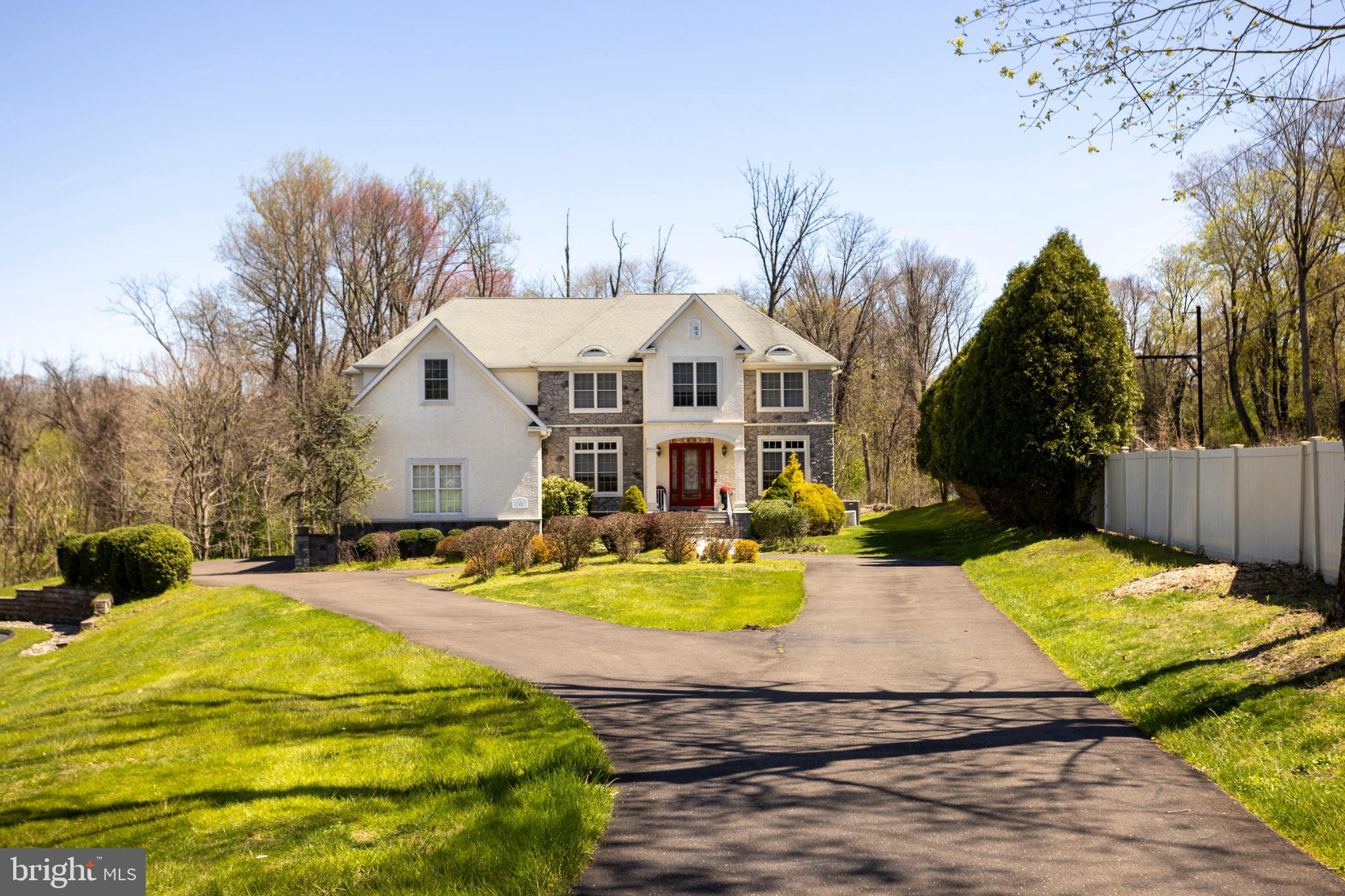 Introducing this spacious and beautiful Colonial situated on picturesque grounds. This custom home features large rooms, Brazilian cherry hardwood floors, recessed lighting, 12 and 23 foot ceilings and an abundance of windows that allow natural light to illuminate all the rooms. This home is luxury at its finest. The front grounds offer a stone pillar entrance with a long driveway that leads to the home. Enter through the front door to a 2 story Foyer with 2 sets of double door coat closets and a spiral staircase to the second level. The Dining Room and Study both feature large picture windows overlooking the front grounds, crown molding and columns separating the rooms on either side of the Foyer. The grand 2 story Living Room has crown molding, a ceiling fan, a wall of windows overlooking the backyard and a 2 sided gas fireplace with marble surround. Next to the Living Room are french doors that open to a large Office with a custom built-in desk with cabinets and drawers. On the other side of the Living Room is a Family Room that has a gas fireplace with marble surround, ceiling fan, built-in shelves and a second staircase leading to the second level. The Family Room opens to a gourmet Kitchen. This is sure to be a show stopper featuring an abundance of cabinets and counter space, an over-sized island with a stove top, cabinets and seating for 3. The Kitchen also has double ovens, a warming drawer, a hidden walk-in Pantry, tile backsplash, and a spacious breakfast nook surrounded by 2 sets of sliding doors that open to a deck. The deck is partially covered and has stairs leading to the backyard. Completing the main level is a Laundry Room with built-ins, 2 large Powder Rooms and door access to the over-sized 3 Car Attached Garage. The second level has a Primary Bedroom retreat that will wow anyone. The Primary Suite features a Sitting Room and very large Bathroom. The Sitting Room has a gas fireplace surrounded by a built-in desk and shelves on the other side, a ceiling fan and tray ceiling. The Primary Bathroom is sure to be a perfect spot to relax and unwind. The large Bathroom has tile floor, over-sized shower with bench and 2 shower heads, jacuzzi tub, his and her sinks, built-in vanity with lighting, dry bar with additional built-ins and door access to huge walk-in closet. The walk-in closet has custom built-ins and has door access to a second walk-in closet. The second Bedroom is spacious with its own full Bathroom and walk-in closet. The third and fourth Bedroom both have walk-in closets and share a bathroom with shower / tub combo. Completing the second level is a double door linen closet and 2 separate Juliet balconies overlooking the first level. The finished, walkout Basement has sliding doors to a Patio, full Bath with shower, a storage room and closet with built-ins for additional storage. The finished Basement is perfect to use as a Billiards Room or Play Room for kids. This exceptional home also features a whole house generator. This home boasts luxurious accommodations finished to an exceptionally high standard. Make an appointment today, before it's too late!