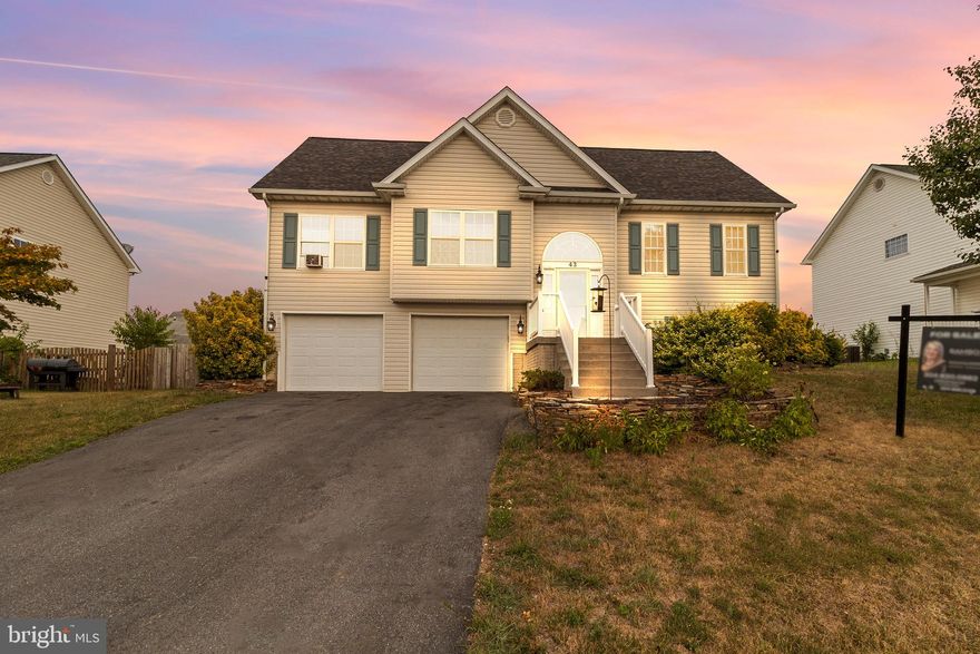 A MUST SEE!!  Charming  LARGE Split Foyer in Quiet Cul-de-Sac.  Welcome to your new home! This delightful split foyer residence offers a blend of comfort and style in a tranquil cul-de-sac setting. 4 bedrooms and 2 full baths make this home great for a larger family.  Enjoy cozy evenings by the natural burning wood fireplace set against a beautiful stone backdrop. Open floor concept, hardwood floors, tile, and carpet throughout.  Modern granite countertops in the kitchen and bathrooms.  Expansive PRIMARY bedroom with tray ceilings and huge walk-in closet.  Luxurious PRIMARY bath with dual vanity, soaking tub, and separate shower.  Mostly finished basement with 4th bedroom, great for teens or man cave. Rough in bathroom in the basement ready to go for an additional bath.   Spacious and level backyard, perfect for entertaining.  Walkout basement for additional living space,  privacy fence enclosing the property, and fire pit for outdoor gatherings. Huge oversized garage for car enthusiasts.  This home combines elegance with practical living spaces, which are ideal for anyone who loves to entertain. Don't miss the opportunity to make this charming property your own!  FYI The A/C unit needs a new compressor, seller will put money in escrow after closing for a whole new unit to be installed!