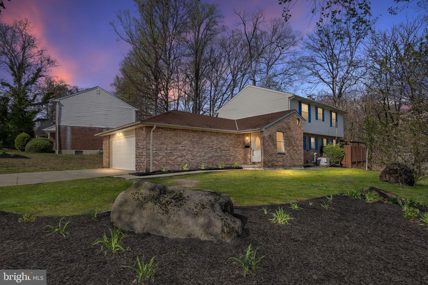 Classic amenities, circular floorplan, and around-the-corner conveniences with home on Coverly Rd.! 
Tucked in coveted Brandywine Hills community with park-like setting of wrought iron streetlamps,
mature-aged trees, and ribbons of sidewalks is this beautiful 3B/2.5B  brick/siding corner home
with dual-width driveway, front-entry 2-car garage, and wrap-around deck.  Ideally located, home is
walkable to Rockwood Park and Greenway trail, as well as Wilm Brew Works and coffee cafes. It is down
the road from Branmar Plaza, 1 mile to Rt. 202 corridor, and easy drive to downtown Wilm. restaurant
and entertainment scene. Plus, merely steps away from bus line, 10 mins. to Wilm. train station and 25
mins. to Phil. Airport. Foyer of home is warm and welcoming with vaulted ceiling, carpeted staircase,
and sizable alcove, perfect for catch-all table. Appreciate endless stretch of handsome main level
hardwood floors, neutral hues throughout and lovely, open layout. To left is expansive LR where gem of
room is a 4 ft. bump-out that offers extra square footage and showcases stunning bay window with wide
ledge, home for potted plants and framed photos. Collection of couches and chairs can easily be
arranged for conversing with friends and capturing natural light. 2 stately columns, which elevate
elegance, subtly mark oversize entrance to equally imposing, adjoining DR which offers spacious window
and wall for dining hutch/chest. Small corridor with alcoves on both sides, ideal for built-ins to display
blooms, baskets and books, connects DR to hallway with PR/laundry room, validating free-flowing floor
plan. Applaud the architecture here! Cleverly, DR is completely open to kitchen and borders a breakfast
bar that serves double duty both as extra seating in DR and for casual snacks and chats in kitchen.
Complementing contemporary vibe and soothing cream colors, kitchen does not disappoint! Striking cream cabinets/2 upper glass cabinets are accented with brushed bronze hardware, while rich granite
countertops provide dramatic contrast to sleek SS appliances. Kitchen extends to delightful sun-infused
morning nook where round table accentuates the space and glass sliders grant access to sweeping deck.
This front-to-back succession of main rooms creates fluid floorplan where movement is seamless.
Kitchen effortlessly wraps to cozy FR with floor-to-ceiling brick FP nestled in corner, while windows
grace far wall. Enjoy a fire on a cold winter’s night while catching up on the latest news or watching the
newest movie! Hall from FR leads past PR, laundry room, hall closet, and LL access, back to front foyer.
Bonus beauty is finished LL with alcove for bar, pocket door to storage and large separate room that is
perfect for office nook, playroom, exercise area, or craft corner! Relish another level of living! Carpeted
steps from foyer lead to landing with porthole window and continue to 2 nd level where pull-down attic
maximizes storage in home. 2 spacious secondary BRs feature tan carpeting, ceiling fans, and large
closets, while situated between 2 BRs is updated hall bath. Welcome to splendid and sprawling primary
BR! Grand double doors offer glimpse of what’s to come as well as granting access to this luxurious and
large primary suite that encompasses width of home with additional space for charming sitting niche or
retreat area. Enjoy lavish ceramic tile bath of both shower and soaking tub, as well as big walk-in closet
with window and all-around room for all-season wardrobes! During warm months, step outside and
soak up the sun on the open deck or experience dinner al-fresco on the covered deck. Best of both
worlds! Appreciate nature’s changing colors and scents in a private and peaceful setting! Enjoy the best of city living in the wooded enclave of Brandywine Hills. Come see why this is one of N. Wilmington's most coveted locations!