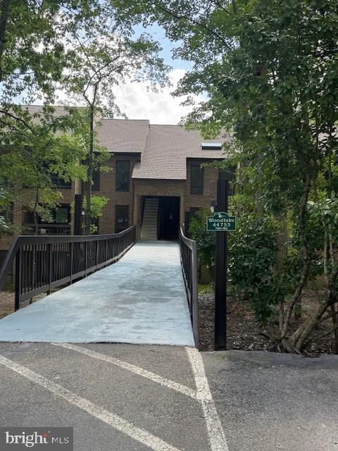 Ground level condo with 2 bedrooms 1.5 baths in Wildewood's Woodlake community. LVP flooring throughout along with a fresh coat of paint. Large living area and dining area. Lots of closet space with a great walk in closet in primary bedroom. This one will be ready by August 8th. No pets and no smokers. Rent includes water, sewer and trash.