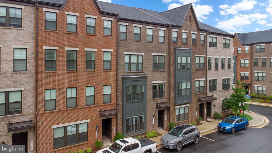 Modern living at an incredible value! Welcome to 43421 Stonewood Crossing Terrace, a stunning 3-bedroom, 2.5-bath townhome-style condo in the sought-after Metro Walk community. Built in 2022, this like-new home offers an open-concept main level with a spacious kitchen and living area, perfect for entertaining. The gourmet kitchen boasts granite countertops, GE Profile stainless steel appliances, a gas stove, and a large breakfast bar.

Upstairs, the luxurious primary suite is a true retreat with hardwood flooring, a spa-like bathroom with double vanities and a large walk-in closet. Recently updated with a brand-new shiplap wall and built-in shelving, this room has a private balcony overlooking trees, perfect for relaxation at the end of the day. The additional bedrooms are spacious with ample closet space. A full bath with tub shower and a convenient laundry area with GE Profile washer and dryer complete the upper level.

The home includes an attached garage equipped for EV charging. The tech package upgrade provides an Eero Wifi 6 system, wifi-controlled garage door, and Ring Home Security System. Step outside to enjoy a walking/biking path that weaves throughout the neighborhood, leading to the clubhouse with its office, gym, yoga room, event space, and an outdoor infinity pool.  The elementary school is just a short walk away.  With four parks and a dog park nearby, there’s tons of green space for everyone to enjoy.

Conveniently located near the Metro Station and a short drive to  the Greenway and Dulles Airport. Plenty of nearby shopping and dining options. Schedule your tour today!