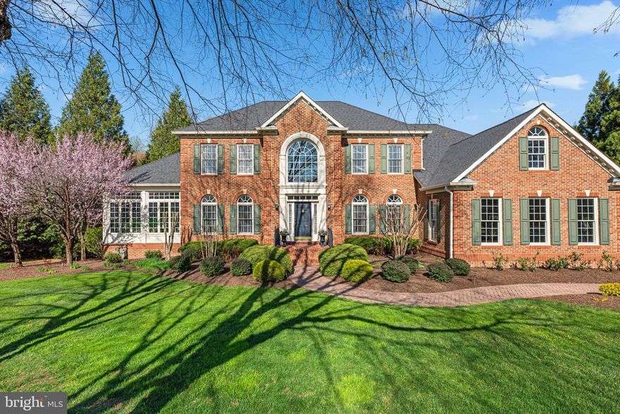 Simply MAGNIFICENT 5 bedroom, 4.5 bath Brick Colonial is now available in the exquisite Tufton Springs neighborhood!  There are not enough adjectives to describe this AMAZING property, as you will see the moment you enter because it will feel like you just walked into the pages of Architectural Digest.  The sellers have spent OVER $375,000 upgrading throughout!  The main level starts with the grand 2-story foyer, 9-foot ceilings, gleaming hardwood floors, the huge Conservatory surrounded with floor-to-ceiling windows, the gorgeous living room & dining room with beautiful molding, the family room with its stone fireplace for cozy nights at home, perfect home office with doors for privacy, and so much more.   The Kenwood kitchen that was redone in 2021 included: white Kenwood cabinets, huge island with quartz countertops & backsplash, Stainless Monogram appliances with transferable warranties, new sink, coffee/wine station, built-in kitchen table nook, Pella windows & new pantry.   The laundry room on the main level was also completely overhauled with new cabinets, new sink, flooring, and undermount lighting.  Take the door out onto the Brazilian Walnut Deck and now you'll feel like you just stepped into an amazing RESORT while overlooking the expansive and breathtaking backyard with plants and trees that are all beginning to bloom.  The custom Lothorian pool with aquatic gardens, waterfalls, hot tub, and newly resurfaced with Pebbletec and new tiling around both the pool and the hot tub.  The hot tub automatically filters itself too!  The pool, pond, hot tub and exterior lighting can be controlled via an app on your phone or with voice controls on Alexa, one of many automations set up in this Smart Home!  The backyard backs onto trees and a stream, plus there are raised organic garden beds ready for your next harvest of zucchini, squash, tomatoes, lettuce, you name it!  Back inside, the main level also has a powder room and the door out to the oversized 3-car garage complete with new garage doors (2019) and granite garage floor (epoxy).    Upstairs is where you will find the 4 bedrooms, all with new carpeting and 3 full bathrooms.  The primary suite was modernized in 2021 and has high ceilings, a custom closet that you must see to believe, and an outstanding en-suite with marble tiled floor, new seamless glass shower, free standing tub, new double vanity, new lighting, toilet and Frame TV!  The other bedrooms are generously sized, and one has an ensuite, while the other two share the guest bath.  The lower level does not disappoint with a 2nd large family room, a games room with built-in bookshelves, 4th full bathroom and a home gym / 5th bedroom with newly installed LVP flooring.  There is also a built-in wet bar with a dishwasher and fridge for enjoying the big game!  The lower level also has plenty of storage areas with built-in shelving and a workshop for the handyman.  Everything has been thought of in this one-of-a-kind home!  You will feel like it was just built, it has been so updated and well maintained.  New Pella Windows & Doors (2016), New Roof & Gutters (2021), Hardwood Floor & Bannister - refinished (2021) Laundry room (2017), HVAC 2017 & 2015, Cedar Roof on Pool Equipment House (2025), Fireplace modernization (2021).  SMART home automations, all of these can be controlled on an app or Alexa: Sensi programmable thermostats, Eve Motion blinds in the Conservatory, Monogram convection wall oven and microwave convection, home security system, security cameras, & even the Samsung Frame TV!  Many come with warranties that will be listed in the disclosures.  All of this and your location cannot be beat!  You have the peace and serenity of Tufton Springs and yet you can get to Hwy 83 or Hunt Valley Town Center in minutes or take a short drive to downtown.  Hwy 695 is close too!  Professional photos and 3D Matterport scan coming soon!  Check back for more details!