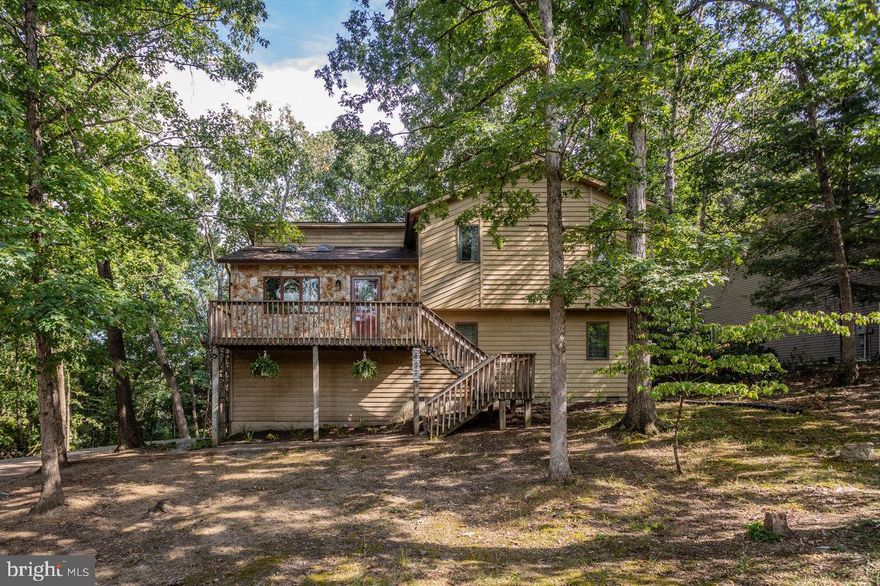 Welcome to your perfect mountain escape in the heart of Massanutten Resort, a premier four-season destination with endless amenities! Tucked away in a quiet cul-de-sac and surrounded by serene woods, this charming 3-bedroom, 2.5-bath home offers the ideal blend of comfort, privacy, and resort living.
Step inside to a bright, open-concept main level filled with natural light, thanks to soaring ceilings and skylights that create a warm and inviting atmosphere. The freshly painted interior and newer roof mean you can move in with peace of mind and start enjoying right away. Downstairs, a cozy vibe sets the mood for relaxing evenings after a day on the slopes, golf course, or hiking trails. Whether you're looking for a primary residence, second home, or vacation rental, this space offers flexibility and charm. The easy-maintenance yard lets you spend more time enjoying everything Massanutten has to offer—skiing, snowboarding, indoor/outdoor water parks, golfing, mountain biking, hiking, dining, and more. Don't miss this opportunity to own your own piece of mountain paradise in one of Virginia’s most sought-after resort communities! Schedule your private showing today!