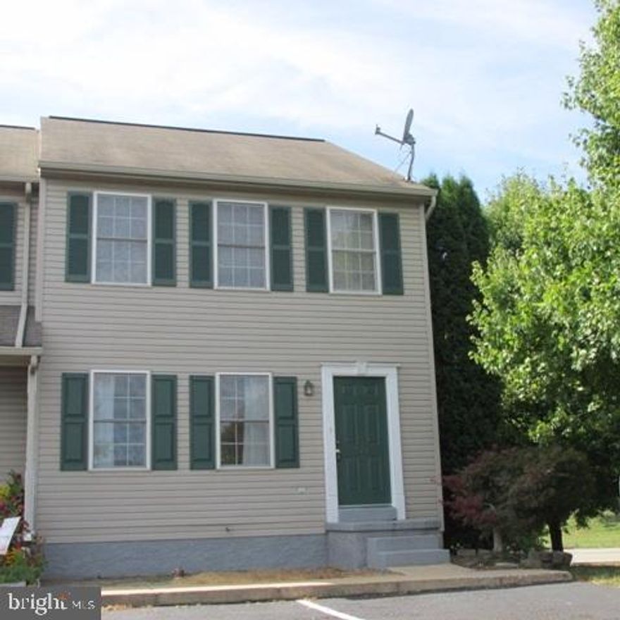 Nice end of row townhome with new carpet, vinyl and shows wonderfully.  Large kitchen and dining area with access to the deck.  Finished lower level walks out to another deck!  Master bedroom with a ceiling fan and cathedral ceilings.  Economical gas heat and central air.  Carefree living in an excellent location with easy access to Route 283.