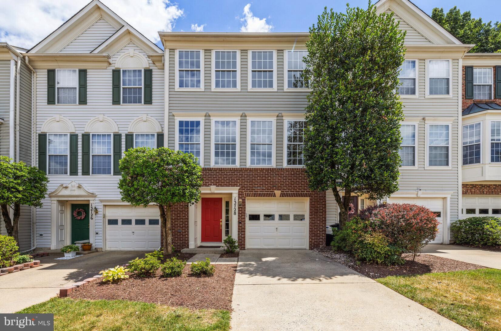 This exquisite townhouse exemplifies modern living, featuring a front entry garage with a convenient driveway. Upon entering, you are welcomed by a versatile open recreation space suitable for various purposes such as a cozy family room, a home gym, or a sophisticated office. The main upper level showcases an open family room and dining area bathed in natural light streaming through expansive windows. The kitchen is a culinary haven, boasting new appliances, lustrous Quartz countertops, refined white cabinets, a stylish modern backsplash, and elegant gold hardware accents. The island offers additional seating, while a charming fireplace infuses warmth and character. Sliding doors open to a private deck, ideal for outdoor gatherings.
Ascending to the second upper level reveals the primary bedroom, featuring a luxurious private bath and a generously sized walk-in closet. Two additional bedrooms, another full bath, and a linen closet complete this floor. This residence has undergone a comprehensive renovation, featuring Luxury Vinyl Plank (LVP) flooring throughout, fresh paint, updated bathrooms with contemporary fixtures, and modern light fixtures. Additionally, the roof was replaced three years ago. Every aspect has been meticulously crafted to enhance both comfort and style.
Conveniently located near major thoroughfares like I-270, this home offers easy access to local parks, dining establishments, and a variety of shopping options including Target, TJMAXX, Walmart Super Center, Starbucks, and more. Seize the opportunity to transform this modern, move-in-ready townhouse into your own haven of sophistication and comfort.
