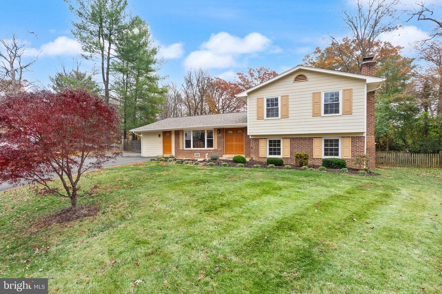 Discover an exceptional opportunity in the heart of Vienna with this 5-bedroom, 2.5-bathroom home.  An ideal sanctuary for anyone seeking comfort, space, and convenience. Set on over half an acre at the end of a cul-de-sac, the property offers a spacious and versatile layout that includes a fully finished basement and an extended garage with separate rooms and its own entry — perfect for a workshop, studio, home gym, or extensive storage. Inside, the home features beautiful hardwood floors throughout the main living areas and a comfortable, well-appointed kitchen designed for everyday living. Enjoy peaceful mornings or relaxing evenings in the enclosed sunroom, or gather outdoors on the patio surrounded by mature trees. With classic colonial character, abundant natural light, and room to grow, this home provides a balanced blend of privacy, practicality, and timeless appeal, all just minutes from the vibrant energy of Tysons Corner.