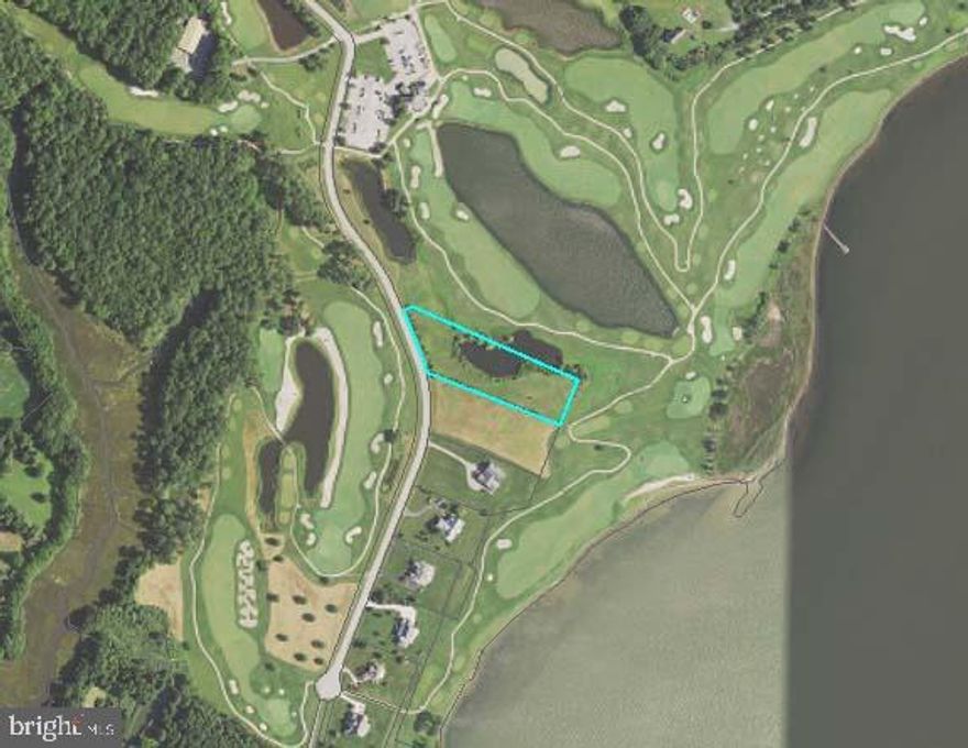 Lot 9A - a beautiful building lot with private pond and boat dock.  Septic already installed and approved. 
 Approx. 2.66 acres with great views of Sinepuxent Bay and Assateague Island! This lot lies in the Atlantic Coastal Bays Critical Area and is classified as a Limited Development Area (LDA).  Lots in the LDA are subject to coverage limits.  Allowable coverage: 115,728 sq ft x 15% = 17,359 sq ft. Zoned E-1. Setbacks: Front = 15", Sides = 8' each, Rear = 50'.