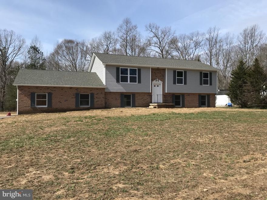 You'll love coming home to this upgraded property. Most  all the perks of new construction without the wait.  Large Country Kitchen with plenty of table space. New appliances and countertops, recessed lighting. Slider leads out to nice size deck. 3 bedrooms 2 full baths upstairs. Lower level has Family room and  access to side loading garage,  Owners Suite, 3rd full bath , laundry. Room for everyone with plenty to spare Level yard is perfect for entertaining, playing sports etc.