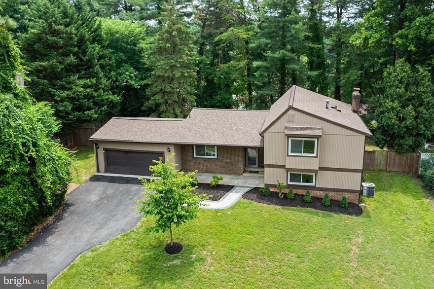 Rare mid century modern classic home in Stonegate with 2023 upgrades.  Open floor plan with wide open views on main level. Cozy lower family room space. Oversized deck overlooking lush yard. Recently updated modern Kitchen, hardwood floors, new carpet, fresh paint throughout. This property boasts four spacious bedrooms and two full bathrooms on the upper level, including an Owner's Suite flooded with natural light. The lower level offers an additional guest room with a bathroom nearby, as well as a family room. The formal great room features a soaring two-story ceiling, while the dining room, gourmet kitchen, and glass doors leading to the deck make entertaining a breeze. Additional features include an oversized two-car garage with ample storage space, long driveway replacement roof, windows and more.  Just minutes to HWY- ICC 200 (Toll), New Hampshire (RT 650) Colesville Rd,(US 29), and minutes to school and shopping centers. Minor delay from property prep. showings start 7/20.