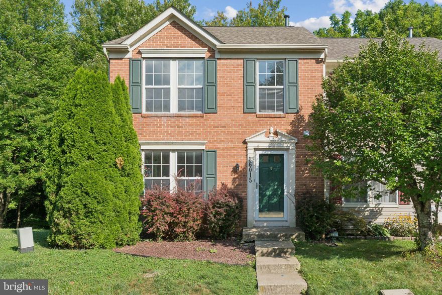 Welcome to this beautifully maintained brick end-unit townhome located in the highly desirable Ridgeview Townhouse community of Damascus. Recently refreshed with brand-new carpet and fresh paint throughout, this home offers a move-in-ready experience from the moment you step inside.

The light-filled main level features an open-concept layout that’s perfect for both everyday living and entertaining. The spacious living area flows seamlessly into an expansive eat-in kitchen with an oversized island, ample cabinetry, and generous table space. Just off the kitchen, step out onto the large private deck—ideal for outdoor dining or relaxing while enjoying peaceful wooded views.

Upstairs, you'll find three generously sized bedrooms, including a stunning primary suite with soaring cathedral ceilings, a walk-in closet, and a private ensuite bath. The newly carpeted, finished lower level offers a cozy recreation room that opens to a charming paver patio—perfect for quiet mornings or hosting guests.

This home is part of the Ridgeview Townhouse Association, a well-kept community known for its walkability, friendly neighbors, and access to nearby green spaces. Just a short stroll to Damascus schools, local dining, shopping, and community parks. With scenic trails nearby and easy access to major commuting routes, this location offers the perfect balance of small-town charm and modern convenience.