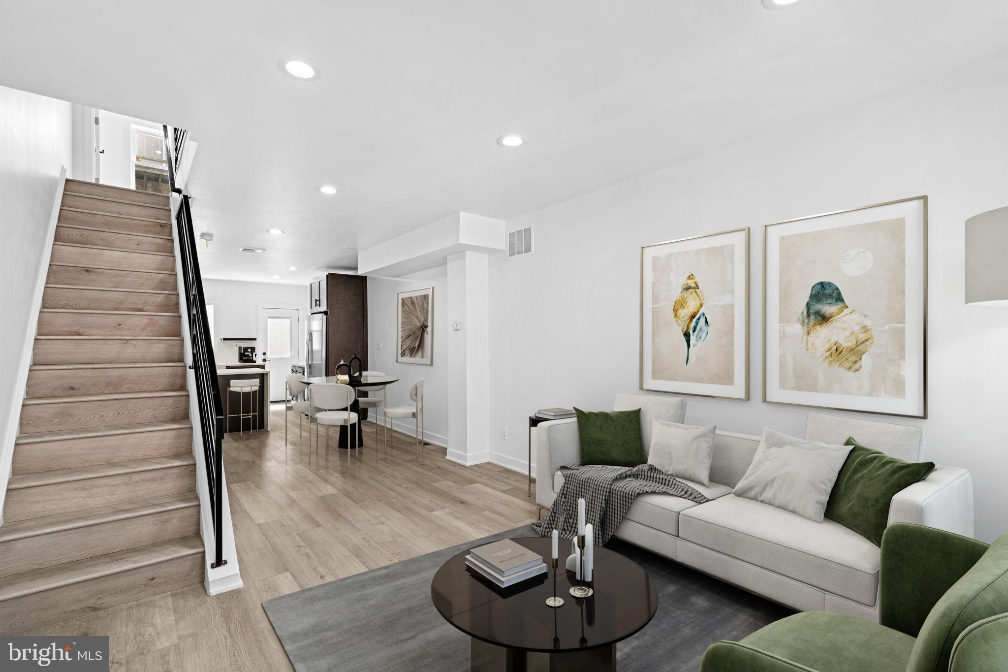 OPEN HOUSE THIS SATURDAY, 5/3 12-2 PM • Here’s your chance to become the newest resident just off popular Dickinson Square Park! Located in the Pennsport/Dickinson Narrows neighborhood on a quiet park adjacent block is 1721 S Orianna Street, a newly constructed townhouse offering three bedrooms and two bathrooms, including a third-floor primary en suite and roof deck.
The main level open floor plan combines a living room, dining area, and spacious kitchen with breakfast bar, separate coffee station, and ample prep area among the beautiful quartz countertops by Cosentino of Spain, including a granite composite sink and faucet from Blanco, and cabinetry by Makellos, a local Philly company, and stainless steel appliances. The rear patio is spacious, private, and offers a convenient side alley that allows front-to-rear property access.
Two second-floor bedrooms share a sleek, full bathroom lined with imported Italian tile and a quartz vanity. The third-floor primary en suite includes a walk-in closet and a magnificent spa-like bathroom with an oversized, glass-encased shower lined with gorgeous full-slab Italian porcelain walls, a double quartz vanity, and high-end bathroom fixtures. *Ask about the bonus primary-level balcony!* Topping it all off is a sunny, spacious roof deck ready to host friends and family!
Pennsport and Dickinson Square Narrows are highly sought-after neighborhoods with ongoing development and close-by retail and grocery along Columbus Boulevard, with nearby access to the Delaware River Trail and I-95 access points. Tax abatement pending! *Some Photos have been virtually staged*