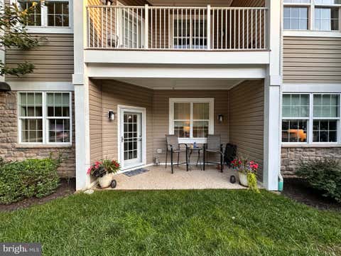 Photo of 901 Macphail Woods Crossing #1I, BEL AIR, MD 21015 (MLS # MDHR2059218)