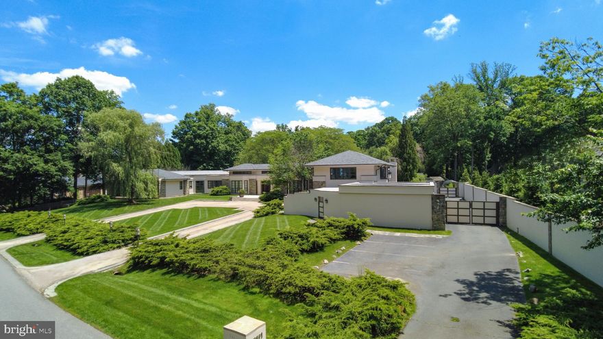 PRICE REDUCED!! Featured Property in Washington Post and Washingtonian. Opportunity to make a deal and call this spectacular property your home!
Originally Custom built by Mark Lerner, principal owner of Major League Baseball's Washington Nationals, with the highest quality commercial grade materials! 
• Short stroll to Potomac Village
• Classical-contemporary, embassy style residence. 
• Easy commute to DC & Northern VA
• Multi-million dollar renovation & expansion completed by the
home’s original architect, JERRY HARPOLE, including extraordinary primary bed-
room suite on main level & unparalleled lower level
• Resort like estate situated on 2 + lush acres
• Sun Drenched Cheery Home
• Sophisticated infinity pool, picturesque patios & Terraces overlooking private yard 
• Art Deco inspired commercial home movie theatre 
• Elegant, flowing indoor outdoor living space
• Commercial bowling alley and AMF Score System
• Floor to Ceiling windows in each room unite scenic vistas with
interior creating a soft, warm atmosphere within the grand spacious floorplan
• Fitness room / Gym with panoramic views of the outdoors
• Spectacular commercial grade kitchen with top of line Gaggenau appliances
• Game room
• 7 Bedrooms, 5 on the main level, all ensuite, including the Primary bedroom wing addition
• Separate living area on an upper level for in law suite or guests, also perfect for Au Pair, includes a large family room, bedrooms, 2 full baths. Additional guest room with large bedroom plus full bath on lower level
• 8 Full bathrooms, 4 half bathrooms 
• Commercial/industrial size walk in freezer and cooler
• 6 Garage Spaces 
*Oversized 4 car garage with side entry and door leading into main level mudroom. 
*Additional oversized 2 car garage with side entry 
*Gated driveway leading to garages 
• All the amenities to enjoy relaxing or entertaining!