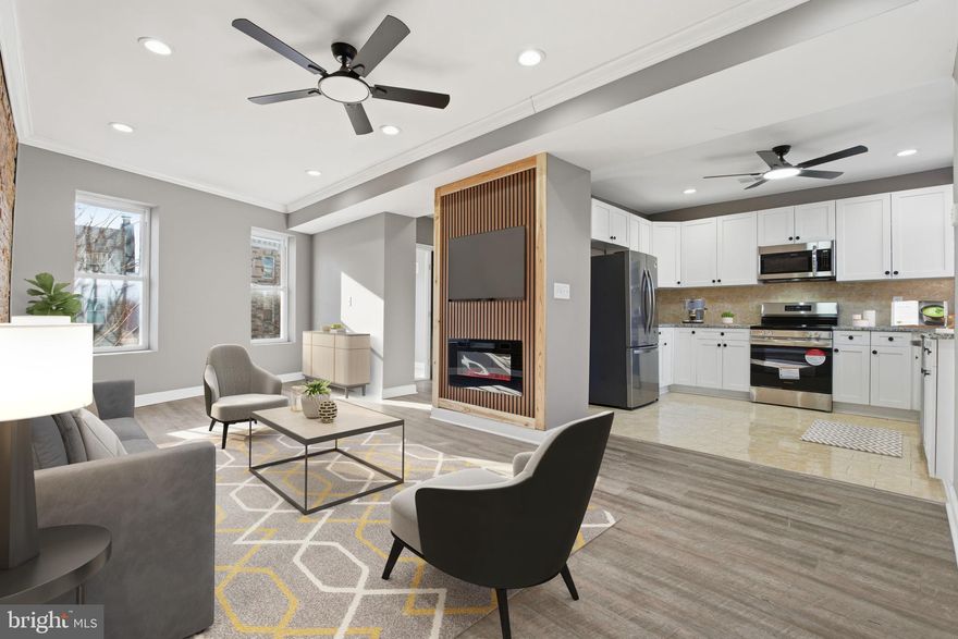 Stunning newly remodeled home created by seamlessly combining two townhomes into one expansive residence, offering over-sized living and modern design throughout. This 5-bedroom, 3.5-bath property features a top-floor primary suite, and a fully finished walk-out basement—ideal for guests, home office, or additional living space. The main level features bright, open living spaces, modern finishes, and a sleek upgraded kitchen with new cabinets, premium granite countertops, and stainless steel appliances. Spacious upper-level bedrooms and updated baths provide comfort and flexibility The home also offers the potential to add a rooftop deck, providing future owners with the opportunity for outdoor entertaining and gorgeous city views. Located on a beautiful block with multiple nearby renovations, just a few blocks from Grace Medical Center and one block from Bon Secours Community Center. Motivated seller offering to cover closing costs for qualified buyers and open to creative financing options. A rare opportunity for space, value, and flexibility. Located 5 minutes from the stadiums, downtown Baltimore and major commuter routes—schedule your showing today.