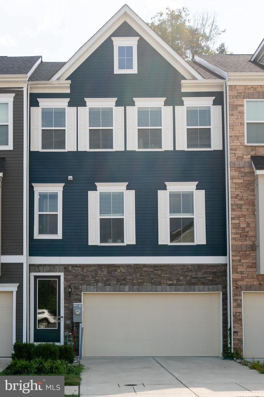 Welcome to 1445 Honeylocust Drive!  This spacious and beautifully maintained townhome built in 2020 is located in the heart of Gambrills! This 3-bedroom, 2.5-bath rental offers the perfect mix of comfort and convenience. Enjoy a bright open floor plan, updated kitchen with a gas range, double wall oven, stainless steel appliances and a cozy living space that flows right out to your private deck — perfect for relaxing or entertaining. Upstairs, you'll find generously sized bedrooms, including a primary suite with a walk-in closet and en-suite bath. The finished lower level adds even more living space and includes a convenient half bath — perfect for a home office, gym, or extra hangout area. Located just minutes from Waugh Chapel shopping, restaurants, and major commuter routes, this home makes daily life easy.  Don’t miss out on this move-in ready gem!