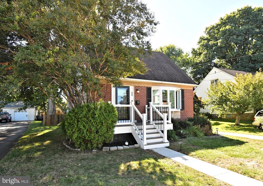Welcome to this fully renovated and welcoming cape cod style home. This home has it all! Stunning hardwood floors throughout with neutral colors and a custom feel as you wander through each room. The formal living room and dining room lead to a modern kitchen and a large family room with a cozy fireplace. The sun room is a wonderful area to relax after a long day or entertain friends and family. The renovations keep coming with the 4 year young tile bathroom. This home has been redone top to bottom. The electrical system, plumbing, heating, air conditioning, appliances, kitchen, baths, windows, and flooring are all only 4 years old! Make your appointment today to tour this beautiful home!