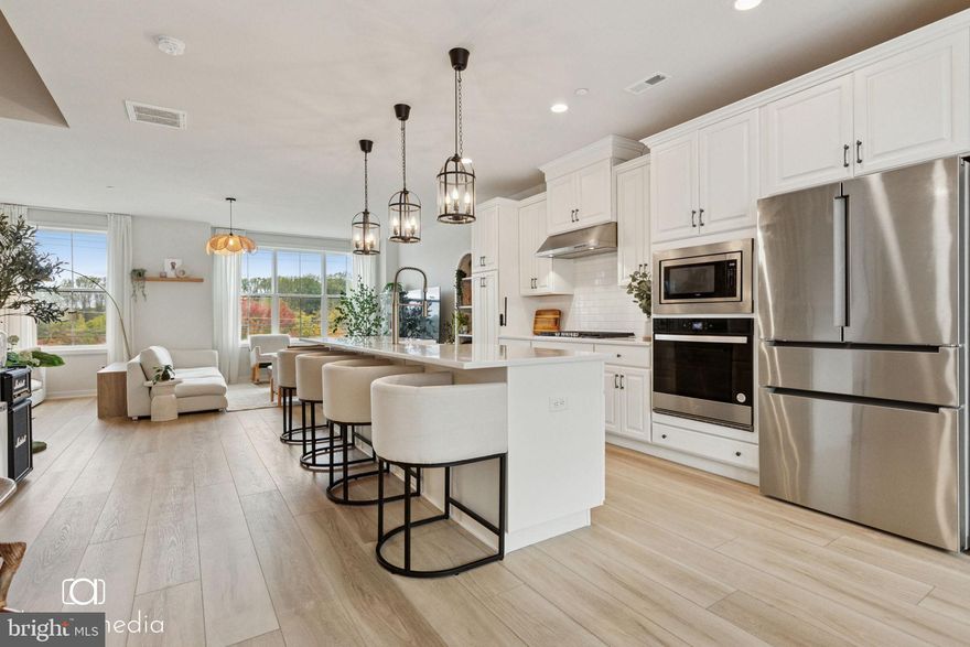 Welcome to 304 Star Tavern Lane – a beautifully designed, move-in-ready townhome in the heart of West Chester’s desirable community, completed in 2023. This nearly new construction offers the perfect blend of luxury, space, and location—just minutes from the shops and restaurants of downtown West Chester, and with easy access to King of Prussia, major highways (Route 202, Route 30, and I-76), and top-rated schools in West Chester Area School District.

As you approach, a charming front entrance welcomes you into a private community courtyard enclosed by a decorative fence—offering enhanced safety, privacy, and a unique shared green space that gives this row of homes a sense of community and tranquility.

The entry-level offers a generously sized bedroom to the left of the front foyer, perfect for guests or a home office. (Note: due to moving preparations, this room is not fully captured in photos, but dimensions are available on-site.) A full bathroom is also located on this level—though it is not reflected on the floor plan image. Down the hall, you’ll find a large utility room, under-stair storage, and access to a spacious 2-car garage, currently set up as a personal gym.

Upstairs, the open-concept main living level is flooded with natural light and features high-end finishes, wide-plank floors, and a modern, neutral palette. The gourmet kitchen includes an oversized island, stainless steel appliances, and abundant cabinetry, flowing seamlessly into the spacious dining area and living room. Adjacent to the dining area is a flexible den space—perfect for additional storage, a reading nook, or a children’s playroom—as well as access to a private balcony, ideal for morning coffee or evening relaxation.

The third floor features three bright and comfortable bedrooms and two full bathrooms. The expansive primary suite includes a walk-in closet and a stylish en suite bath with a double vanity, glass-enclosed shower, and elegant fixtures. For added convenience, the laundry is located on the bedroom level.

As a thoughtful addition, the current owners installed removable soundproofing panels in one of the secondary bedrooms to minimize noise during their newborn’s early months—strictly for courtesy to neighbors, not due to construction issues. These panels can be removed prior to settlement if desired.

This home has been professionally cleaned, paint-touched up, and is ready for its new owners to move in and enjoy. With its modern finishes, versatile layout, and prime location, 304 Star Tavern Lane is truly one of the most exceptional values in the area. Come tour this