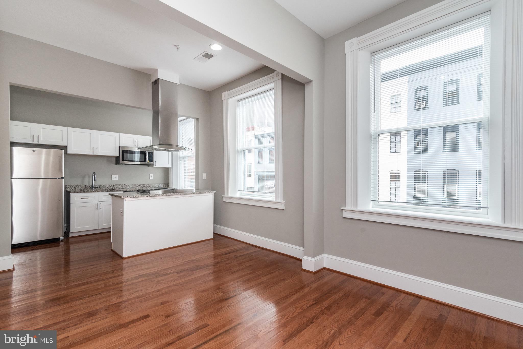 108 W. Saratoga features renovated apartments with all the amenities such as hardwood floors, high end bathroom finishes, granite counters, stainless steel appliances, washer dryers in the unit, central AC and more. The building is wired for cable/internet and ready for Comcast to hook you up. This apartment, Unit seven is a 2 bed 1 bath on the top floor overlooking Saratoga street. It has an abundance of natural light. There is off street parking available for $125 a month. Available first week of May. Don't miss it!
