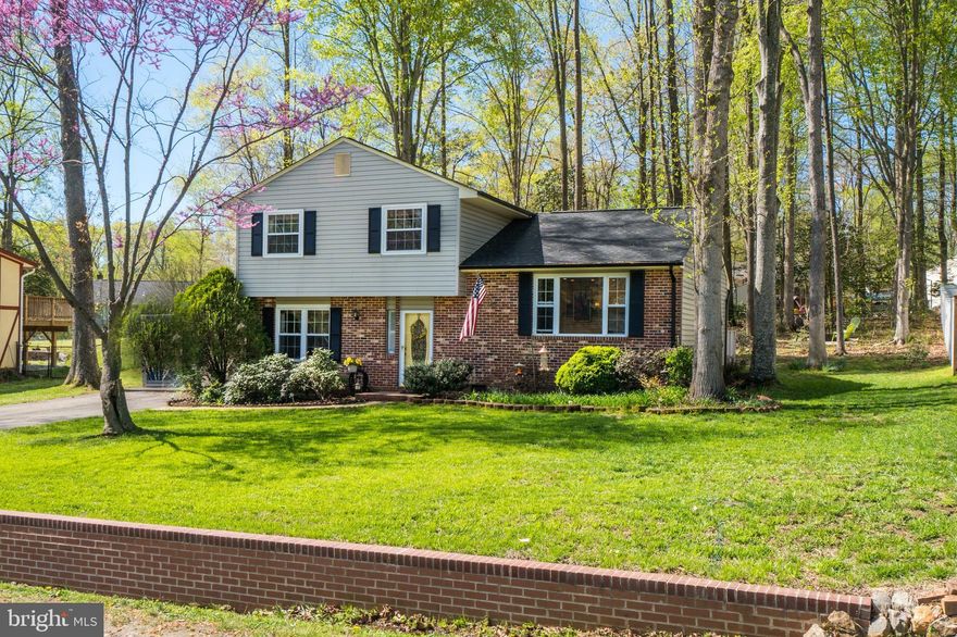 Move-In Ready, Updated Home with open Floor plan in Quiet Neighborhood.  OVER 1600 FINISHED SQUARE FEET! Recently updated with Gorgeous kitchen and hardwood floors!  Stainless appliances, large island with storage, undercabinet lighting, recessed lighting and leather textured, granite countertops!  Updated bathroom with tile floor and glass enclosed shower! Cozy Family Room with gas log fireplace.  Flex space can be used as a separate office or possible 4th Bedroom (NTC).  Large Deck to enjoy the backyard.  Detached shed for storage or hobbies.  Newer, roof, gutters and HVAC! NO HOA. Close to shopping, schools, commuting routes, Lake Anna and Downtown Fredericksburg! This home has been meticulously maintained.