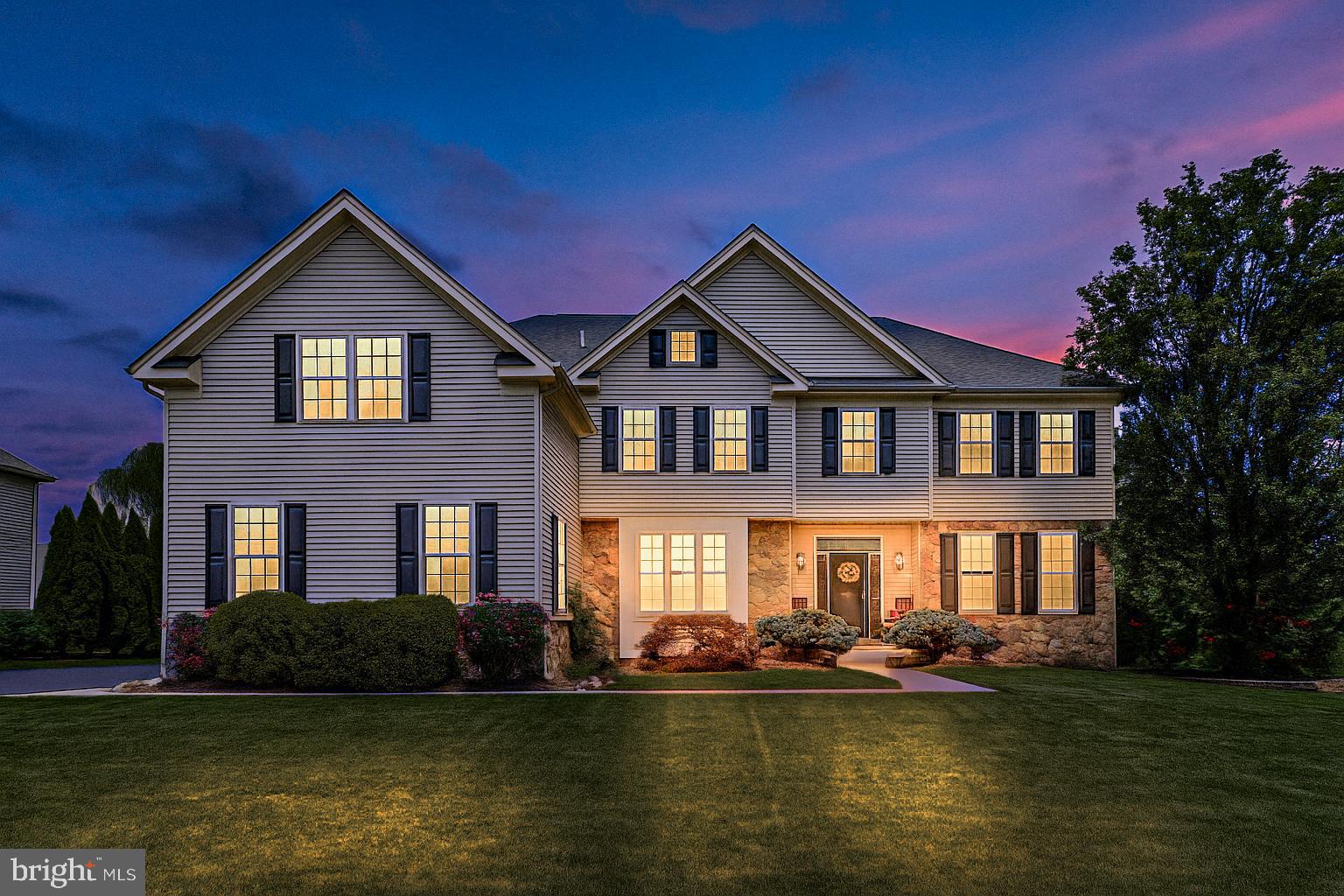 Welcome to 2071 Derbyshire Road, a stunning and spacious colonial tucked into a quiet corner of the highly sought-after Devonshire Estates community. This is the largest model in the neighborhood, ideally situated across from lush, open space. The front exterior has been thoughtfully updated with neutral siding, stone accents, front windows, and a gorgeous new front door that sets the tone for the refined elegance found throughout the home.
Step into a grand two-story foyer with gleaming hardwood floors and an impressive staircase, bathed in natural light. To the right, a quaint formal living room that leads into a large private home office with double doors, perfect for remote work or a quiet retreat. To the left of the staircase, a formal dining room provides an ideal setting for entertaining which flows directly into the chef’s kitchen.
The heart of this home features upgraded cabinetry, granite countertops, stainless steel appliances, pendant lighting, and a spacious eat-in area. Sliders open to a Trex deck with built-in lighting and a paver patio, all overlooking a flat, private yard enhanced by mature plantings and professional landscaping.
The expansive great room boasts soaring two-story ceilings and a striking stone fireplace, creating an inviting space to relax and gather. A convenient back staircase leads to the second level, where you'll find a thoughtfully designed layout.
The primary suite is privately situated and includes a sitting room, ideal for a second office, nursery, or yoga space, dual walk-in closets, and an ensuite bath with a soaking tub and separate shower. Down the hall are four additional bedrooms, including a princess suite with a private full bath, and three bedrooms that share a hall bath with dual sinks.
The finished basement offers exceptional flexibility with a half bath, bonus/guest room potential, and plenty of unfinished storage space. Most recent updates include interior professional painting, three new garage doors and mechanicals, new dual-zone HVAC, hot water heater, and a water filter and softener system, offering peace of mind for years to come.
Lovingly maintained and move-in ready, this exceptional home offers space, style, and privacy in one of the area’s most desirable neighborhoods in the award-winning Central Bucks School District.
Don’t miss your opportunity. Join us for the open house or schedule your private tour today!