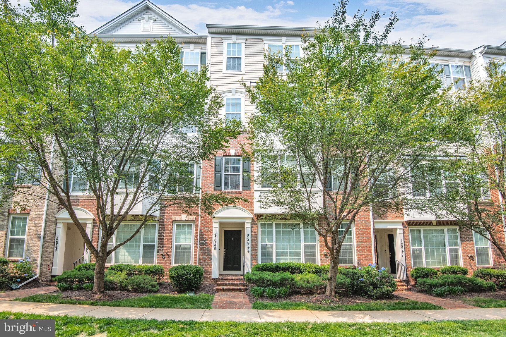 With over 2,500 square feet of thoughtfully designed living space, this condo townhouse offers an inviting blend of comfort, style, and natural light. Step inside to find an open floor plan anchored by a gourmet kitchen featuring 42-inch cabinets, granite countertops, stainless steel appliances, and a large center island with bar seating—perfect for both everyday living and entertaining. The kitchen flows seamlessly into a bright family room with a fireplace and sliding glass doors leading to a deck, ideal for outdoor dining or relaxing. The main level also features wall-to-wall windows, a spacious living room, formal dining area, convenient powder room, and a sunlit office nook off the living room. Upstairs, the expansive primary suite boasts a luxurious en-suite bath and a generous walk-in closet. Two additional bedrooms, a full hall bath, and a laundry area complete the upper level, providing comfort and convenience for the whole household. Nestled in a vibrant community, residents enjoy access to two pools, playgrounds, a clubhouse, tennis courts, lush green spaces, and scenic walking trails. This is a rare opportunity to enjoy great amenities in a prime location—truly a place to call home.