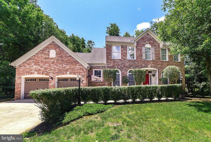 Beautiful updated home on 4th Tee of Breton Bay Golf Course!  This is a great home with extensive hardscape/mature landscape to enjoy the summer.  The floor plan offers plenty of living space for everyone.  Most rooms have custom window treatments or plantation shutters and the main level floors are mostly hardwood.  The gorgeous kitchen design offers tons of custom cabinetry, SS appliances, granite counters, large island, updated tile floors and breakfast area. Kitchen opens to large family room with wood burning fireplace.  Cheerful sunroom adds to your year-round enjoyment and has great view of the landscaped backyard.  In addition, you'll find a nice private study with glass French doors, separate dining room and full laundry.  The upper level features four sizable bedrooms with three full baths and plenty of closet space.  In the basement you'll find an exercise room, large game room with outside access, office space and another full bath.   The garage is over-sized and has lots of cabinets for storage.  Some of the extras you'll get with this home:  underground lawn sprinkler system, invisible fence, retractable awning at back patio, whole-house generator and gutter leaf guards.  Walk to the community beach area (currently $50/yr), Breton Bay Golf & Country Club (pool requires membership), or a small private marina if you have a boat.  This is a great lifestyle to enjoy all year!