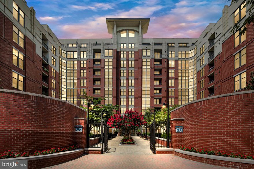 Welcome to 1021 N Garfield, a stylish high rise in the heart of Clarendon. This updated unit on the 7th floor includes hardwood floors, a large bedroom with a walk-in closet, a cozy gas fireplace (new insert installed), and a private balcony with treetop and courtyard views. The kitchen was renovated in 2022 and features ProCraft Liberty Shaker cabinets, stainless steel appliances, MSI Carrara Lumos countertops, Bellucci Blanca Matte Porcelain tile, a gas range/oven, built-in microwave, and is open to the dining and living areas. Floor-to-ceiling sliding glass doors in the living room provide abundant natural light. The recently renovated bathroom (2022) boasts matching Shaker cabinets, Carrara Lumos countertops, Belucci Bianca tile, and a new toilet. Clarendon 1021 offers a 24-hour concierge, rooftop pool and grills, onsite fitness center, conference room, community room, a dedicated underground parking space (B1-36), is pet friendly, and much more. A perfect location to enjoy all that Clarendon offers, including shopping (Whole Foods, Trader Joe's), restaurants, entertainment, and easy access to Metro.