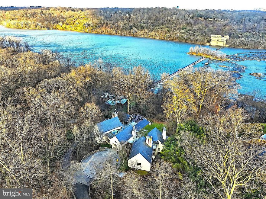 **WATERFRONT ESTATE. This pinnacle estate crowns the hill with unrivaled views of the Potomac River. Situated across 3.64 acres of  sculpted land in revered McLean where LEGACY MEETS LUXURY.  This breathtaking waterfront estate marries timeless architecture with nature in the most beautiful way. Over 8,000 square feet of exquisitely crafted, light filled living spaces that feel both expansive and intimate.   Gracious formal rooms and soaring windows that frame sweeping river vistas at every turn. Outdoors, the property unfolds into manicured lawns and terraces that lead to a show-stopping, resort-caliber pool, complemented by state‑of‑the‑art pool house boasting a private gym with a changing room that includes a shower—perfect for your morning laps or lifting sessions without ever leaving the grounds. Total of 7BR, 6BA and 2 HB. Includes a Wine Cellar, fire places, heated 3 car garage and central vacuum. Also, the garage has extra storage room and its own extra washer/dryer. This breathtaking home has selected limestone, cherry wood, granite and maple. Step through and let the visionary floor plan pull you into spaces that feel refreshed, new—like nothing you’ve stepped into before. River views seem to go on forever, creating a serene backdrop from dawn to dusk and giving the home a rare sense of privacy and escape while still being just minutes from everything.  Located in the prestigious Langley area, this sanctuary enjoys swift access to the world‑class shopping and dining of Tysons Corner Center and Tysons Galleria, as well as major commuter routes and a few miles to downtown Washington, D.C., cultural landmarks etc… Live the unparalleled lifestyle along one of the Capital Region’s most exclusive stretches of riverfront. The listing encompasses both 1100 and 1153 Crest Lane that are 2 lots consolidated into a total of 3.64 acres of prime riverfront grandeur. Please note, the home is in coming soon status and showing will begin this Wednesday the 13th, and it is by appointment to show with 24 hour notice. For your attention, no showings are allowed while in Coming Soon Status.