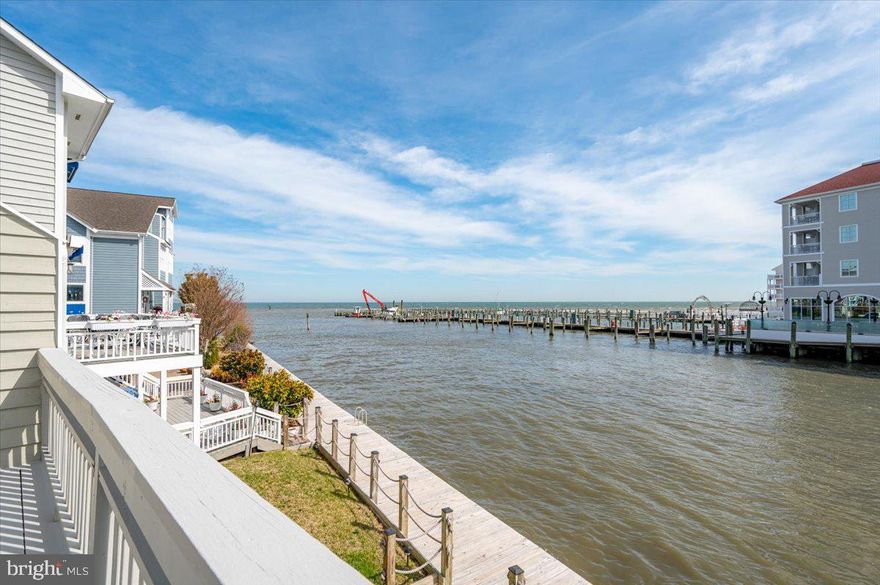 Nestled along the tranquil shores of Chesapeake Beach, this stunning four-bedroom, four-and-a-half-bath waterfront townhouse offers 2,632 square feet of thoughtfully designed living space for those who appreciate the beauty of life by the water. Expansive decks on every level provide uninterrupted views, where you can savor gentle breezes and watch local crab boats set out at sunrise.  Also, this townhome has 2 brand new HVAC systems, new carpet and has been freshly painted.  Move right in and start enjoying your new each life! Because of its location within the community, you can also sit on any one of your decks and catch all the concerts, for free, being held in the spring and summer at the Rod & Reel Bandshell.  This is also the perfect location to catch all of the famous, Chesapeake Beach, 4th of July fireworks without every leaving home. 

Residents enjoy exclusive access to a private beach, pool, pickleball courts, and even has a marina (marina slips are extra and are not deeded to the unit)—creating an effortless blend of leisure and coastal charm.  You can also walk to the Rod & Reel Resort and all it has to offer as well as other in-town restaurants and shopping within Chesapeake Beach.  Do you have a boat?  Within walking distance of Windward Key are multiple marinas.  Both the Rod & Reel and Marina West are within walking distance.   Pull your boat up to the boardwalk, right outside your home to load it up and enjoy life on the bay!  Whether you’re seeking a peaceful weekend retreat or a full-time sanctuary, this exceptional home offers an inviting opportunity to experience refined waterfront living at its finest.