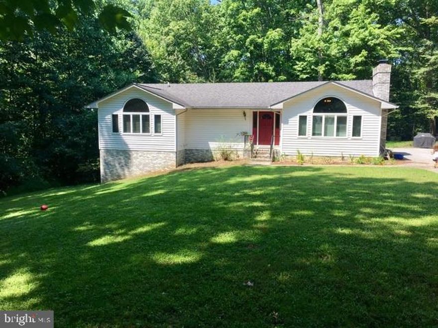 Looking for privacy , yet still want to be close to shopping, schools, navy base.  This rambler with a large fully finished basement might be just what you're looking for.   Fireplace, large deck off the back, 1.84 acres lot. 
Private yet so close to everything!