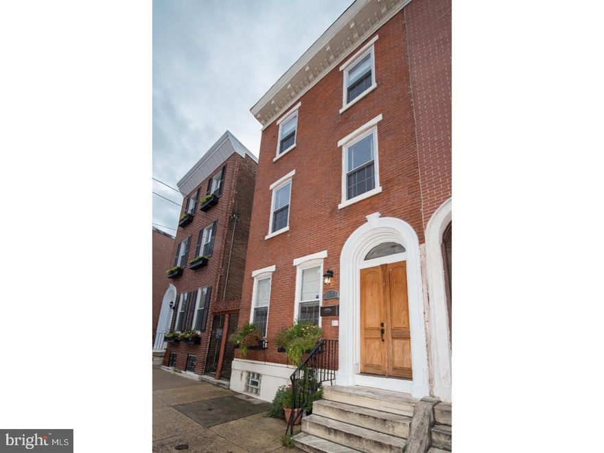 Francisville Find where character meets the every day. 3 bedrooms, each with their own bath, an additional half bath, finished basement, roof deck and parking. Enter the Oversized Double door entry into tiled foyer. Be met with wood floors throughout, Open concept floor plan, exposed brick wall, Gas fireplace, half bath with exposed brick, and French doors to the patio or parking. The Kitchen offers granite countertops, stainless steel appliances, five burner gas cooking, and plenty of cabinet space. Access to finish basement with separate laundry area and storage. Second-floor offers two en suites.  Oversized rear corner bedroom with three windows. Front bedroom textured with brick and wainscoting.  Large master suite on third floor with bedroom and den/sitting room. Bedroom in the rear with gas fireplace and French doors to a Juliet balcony. Rear of master bedroom with Den or sitting area with large closet and master bath. From den area of master bedroom access to the roof deck via open stair case.