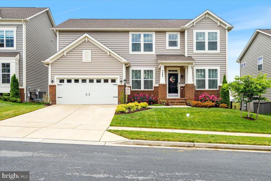 Welcome to this stunning home in Landsdale built in 2020! As you approach, you notice the gorgeous curb appeal and welcoming front porch. As you enter, you are greeted by stunning hardwood floors throughout the main level. The gourmet kitchen is a chef's dream! The double wall oven and large kitchen island make a wonderful place to entertain. The kitchen also features stainless appliances, recessed lighting, lovely backsplash and an abundance of cabinet space. Right off the eat-in kitchen, is the living room with large windows to enjoy the natural sunlight!  Ease of access from the living room to your spacious backyard. The main level offers a formal dining room, sitting room, laundry area and a half bath. The primary suite is spacious and features a large en-suite bath with a double vanity sink and oversized tiled shower stall. The upper level is complete with a flexible loft area, three additional bedrooms and a shared full bathroom. The fully finished lower level features a rec-room/play room or additional living space. The separate gym is the perfect opportunity to work out at home! There is a legal fifth bedroom in the basement with a full bath in basement too! The fully fenced in backyard offers a patio with built-in fire pit perfect for enjoying a summer night! The hardscaping and fencing were thoughtful and high-end upgrades. The Landsdale community offers a pool, tot-lot, tennis courts, jog/walk paths, an active social committee that plans festivals, concerts, food trucks and so much more! Close proximity to  Urbana, Montgomery County, Frederick,  I-70 and 270. Welcome home!