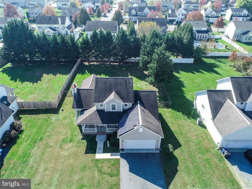 Welcome to 340 Kidwell Avenue, a beautiful home nestled in the heart of Centreville. This lovely property offers a perfect blend of comfort, style, and eco-conscious living, making it an ideal choice for a wide range of buyers. This Eastern Shore gem combines modern amenities with classic charm. The main-level master suite offers convenience and privacy, while the floor plan on the lower level seamlessly connects the living room, kitchen, and dining area, creating an ideal space for family gatherings and entertaining guests. The well-appointed kitchen features all the essentials, including modern appliances, quartz countertops and ample storage, making meal preparation a breeze. Step through the sun room with a vaulted ceiling, out onto the back deck for alfresco dining, where you can savor the serenity of your tree-lined, fenced-in yard.  Solar panels on the roof help keep the electricity bill low or even zero. Location is key, and this property is situated in a friendly neighborhood, with easy access to local amenities, schools, and parks. Centreville offers a laid-back lifestyle while remaining close to major transportation routes, making it a convenient location for commuters. Don't miss the opportunity to own this inviting and energy-efficient home with countless features that enhance your quality of life. Schedule a viewing today and imagine the possibilities of making this your forever home.