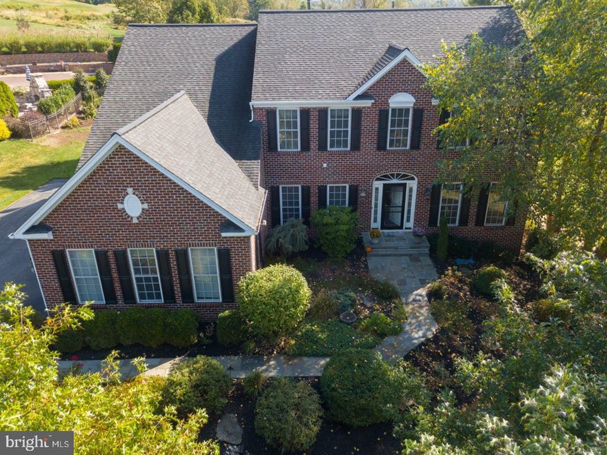 Nestled on an expansive lot just beyond the 6th tee of Broad Run Golfer's Club, this beautiful and spacious home hits all the right notes with a very open floor plan, private setting, and finished walkout basement. First floor offers an office with custom built-ins, formal living and dining rooms with wainscoting, and a sun-filled great room that includes an open kitchen, family room with fireplace, and morning room with captivating views of the golf course. Love to entertain? You'll appreciate the huge Ipe Brazilian hardwood deck that leads from this space to the outdoors. Upstairs is a lavish master bedroom suite complete with a sitting room, large his and her walk-in California Closets, and master bath with shower and garden tub. There are three other bedrooms and another full bath on this floor. A finished walkout lower level includes another full bath and bonus room that could be an additional office or 5th bedroom. Built-in countertops are ideal for crafts and homework, and the bright living area of this basement opens to a private flagstone patio. Plus, three-car garage, automatic sprinkler system, extensive professional landscape lighting, and James Hardiplank siding exterior. Conveniently located in the award-winning Downingtown School District just minutes from West Chester Boro, Marshallton and the Stroud Preserve.