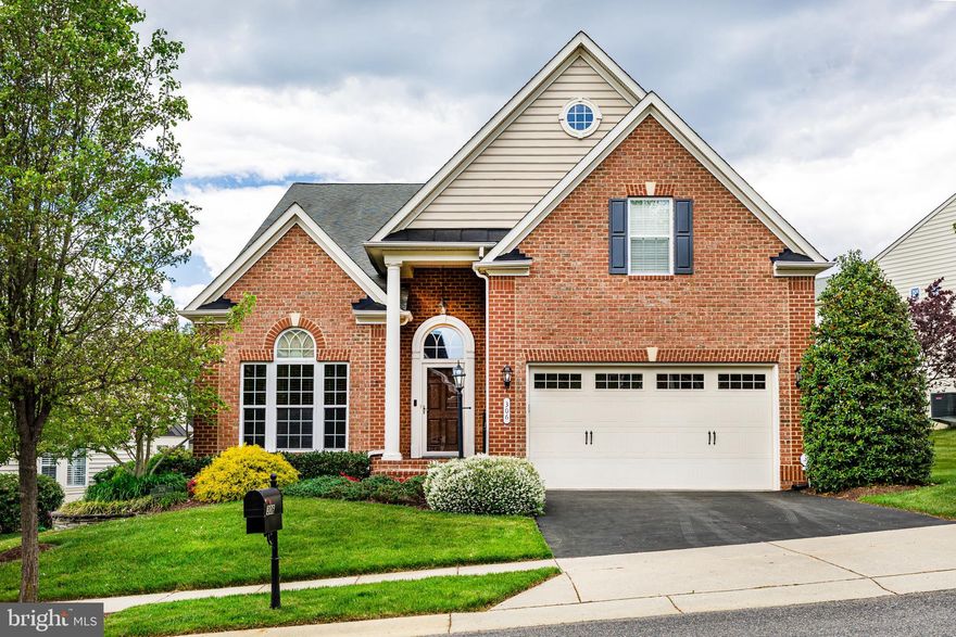 Welcome to 306 Grindstone Drive, an exceptionally luxurious two-story home located in the highly coveted Stonecrest community, a premier active adult neighborhood in Arnold. Ideally situated on a premium lot, this beautifully appointed residence offers 3 bedrooms, 4 full baths, and a dedicated office with built-in bookcases that could easily serve as a fourth bedroom, with over 3,200 square feet of thoughtfully designed living space.
Built by award-winning NV Homes, this impressive residence welcomes you with stately brick exterior accents and a charming covered entryway. Inside, the home is highlighted by Brazilian hardwood flooring, elegant crown molding, custom blinds throughout, and soaring ceilings that create an atmosphere of refined comfort.
The heart of the home features an open and inviting floor plan designed for both everyday living and upscale entertaining. The gourmet kitchen showcases 42" cherry cabinetry, granite countertops, a large center island with breakfast bar seating, stainless steel double ovens, gas cooktop, built-in microwave, double sink, and 18-inch ceramic tile flooring.
Flowing seamlessly from the kitchen, the family room offers a warm and welcoming space with a gas fireplace and beautiful stone hearth, while the formal dining area with tray ceiling and bay window provides an elegant setting for dinner parties and holiday gatherings.
The main-level primary suite is a luxurious retreat featuring an extended bump-out sitting area, ceiling fan, and a custom walk-in closet. The spa-inspired ensuite bath includes floor-to-ceiling tile, dual shower heads, double vanity sinks, and a private water closet, creating a true sanctuary.
Upstairs, guests will enjoy a private bedroom suite with its own full bath, providing comfort and privacy for extended visits.
The fully finished walkout lower level is designed for entertainment and relaxation, offering a spacious recreation area complete with a custom bar with granite countertops, mini refrigerator, dishwasher, and pendant lighting. The space comfortably accommodates a pool table area, exercise space, card table, and television lounge, making it ideal for hosting gatherings with family and friends.

Outdoor living is equally impressive. The screened-in porch with skylights and ceiling fan provides a relaxing space to enjoy the outdoors, while maintenance-free decking leads to a beautiful lower-level patio—perfect for entertaining or quiet evenings at home.
The property is further enhanced by meticulously maintained landscaping with a full irrigation system, creating a beautifully maintained setting with minimal upkeep.
Additional highlights include a two-car garage, laundry room with utility sink and cabinetry, tray ceilings, crown molding, and generous storage throughout.
The Stonecrest HOA maintains lawns and community common areas, allowing residents to enjoy a low-maintenance lifestyle with amenities including walking paths and a charming gazebo.
Conveniently located near shopping, dining, medical facilities, and major commuter routes, this stunning home offers the perfect balance of luxury, comfort, and convenience in one of Arnold’s most sought-after active adult communities.

Schedule your private tour today to experience everything this exceptional home has to offer.