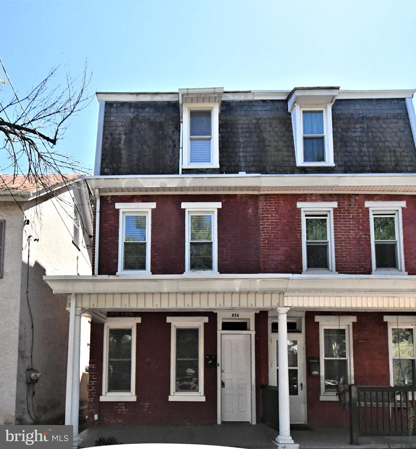 This charming twin home, offers a blend of classic architecture and modern convenience. The home features an eat-in kitchen with attached dining room. Nearby is a half bathroom, with a full bathroom located upstairs among 3 surrounding bedrooms. The interior boasts a mix of vinyl, wood, and carpet flooring, providing both comfort and style. This property is situated with easy access to local amenities and transportation options, making it a practical choice for comfort and accessibility. This residence is ready for your personal touch, offering a unique opportunity to create your ideal living space.