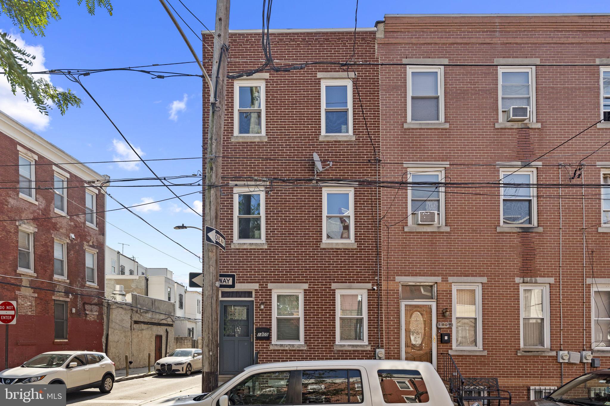 Welcome to 1805 S 5th Street, a spacious and versatile corner property nestled in the heart of South Philadelphia. This three-story home offers an abundance of living space with 6 generously sized bedrooms and 2 full bathrooms, making it ideal for large households, multi-generational living, or those seeking additional work-from-home or guest accommodations.
Inside, the home features a functional layout with an eat-in kitchen equipped with laminate countertops and ample cabinet space. Plywood flooring runs throughout the home, offering a blank canvas for customization and upgrades. The unfinished basement boasts high ceilings, presenting excellent potential for future expansion or added storage.
Step outside to your private backyard, perfect for outdoor relaxation or entertaining. As a corner property, the home benefits from additional windows, natural light, and convenient street access.
Included in the sale are several valuable items, including a washer, dryer, refrigerator, couches, dresser, chest, and remaining contents in the basement—providing immediate functionality for move-in or investment purposes.
Conveniently located close to public transportation, shopping, and some of South Philly’s most vibrant cultural and culinary spots, 1805 S 5th Street is brimming with potential. Whether you're an investor or a buyer looking to personalize a large home, this property offers space, flexibility, and location.