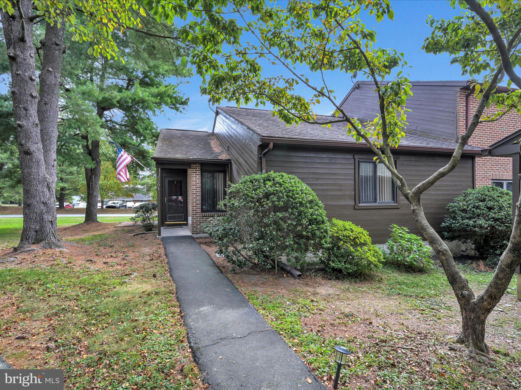 Enjoy the PineBrook lifestyle in this highly sought-after ranch style, end unit townhouse. Also offers 2 bedrooms & 2 full bathrooms. Primary bedroom includes walk in closet & full bathroom. Living room has a cozy propane fireplace with sliders to a patio and large deck. Blue Mountain Schools. One floor living at it's best!