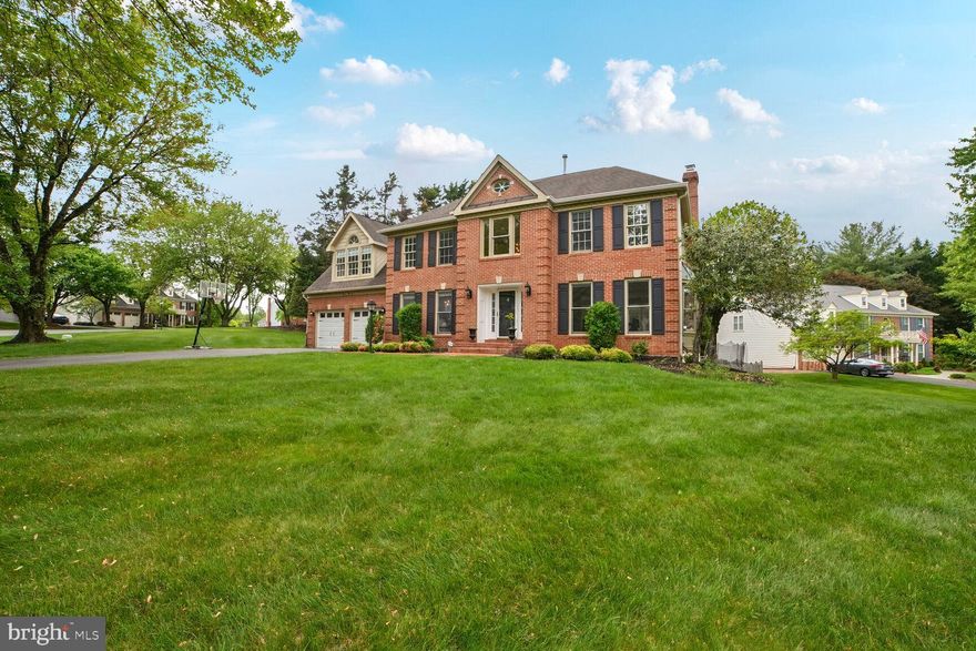 Welcome to 4533 Minuteman Drive, an elegantly renovated colonial-style residence in Rockville, MD, where sophistication meets modern comfort. This splendid home offers an expansive 3,720 square feet of refined living space, set on a generous 18,910 square foot premium lot, backing onto tranquil wooded views, ensuring privacy and serene living.

Step inside through the striking two-story foyer that sets the tone for the bright and open floor plan, adorned with sundrenched windows and strong moldings. Gleaming hardwood floors lead you to the spacious living room, where a charming bow window invites natural light to fill the space. Adjacent is the formal dining room, featuring exquisite box wainscoting, ideal for hosting elegant dinners.

The heart of the home, a gourmet eat-in kitchen, boasts sleek stainless steel appliances, including a cooktop and range hood. Ample cabinetry, marble countertops, a center island, and a cozy casual dining area complete this dream kitchen. The adjoining family room, highlighted by a warming fireplace, provides a seamless flow for entertaining or relaxation.

The expansive sunroom, with its lofty windows and cathedral ceilings, offers an inviting space with easy access to the deck, perfect for indoor-outdoor living. The master suite serves as a serene retreat, featuring soaring ceilings, two generous walk-in closets, and a luxurious master bath.

The upper level offers three additional generously sized bedrooms and a full bath, ensuring ample space for family and guests. The lower level surprises with a recreation room, a dedicated game room, and a full bath, alongside ample storage space.

Step outside to discover beautifully landscaped grounds, a brick-covered front porch, a custom patio, and a fenced backyard, all designed to enhance your outdoor experience. Security features are thoughtfully included for your peace of mind.

This magnificent home is truly a must-see, offering a harmonious blend of classic design and modern amenities. Don't miss the opportunity to make 4533 Minuteman Drive your new address.