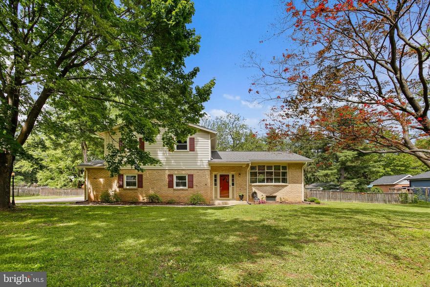 Welcome Home to 7006 Summerfield Drive, a gorgeous brick split-level home in sought-after Clover Hill!  With fresh paint, gleaming hardwood floors and updates galore, this one is a true show-stopper.  The home sits on a large .68 acre lot with mature trees and has a fully fenced backyard  with an expansive patio and large shed. The home's main level features a living room with a giant bay window facing the front yard, an updated kitchen with elegant granite counters and black Stainless Steel appliances, and a sunken family room with recessed lighting and a cozy wood-burning fireplace flanked by floor-to-ceiling built-ins.   The upper level features three large bedrooms, a master with private en suite,, and both full baths were just fully remodeled.  Other recent updates include new hot water heater (2025), new gutters with gutter-guards (2024), new windows and siding (2021), fenced backyard (2021), new variable speed HVAC and WiFi thermostat (2020), new roof (2019) and new asphalt driveway (2019).  The basement has space for rooms and features tons of built-in storage.  The home sits deep within Clover Hill on a quiet street with little traffic, yet is close to FCC, multiple walking paths and parks, and is just minutes to downtown.  All this plus no city taxes and a voluntary HOA (no HOA fees to pay unless you choose to join)  Hurry to see this one before it's gone!