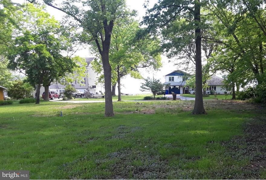 Outstanding water views of the Northeast river with this .34 Acre double lot that is cleared & ready to build. Quiet and serene, private community w/ 2 boat ramps. This river is perfect for boating and there are wonderful restaurants nearby. Water & electric at street. Sewer hook up already in. Corners marked. Waterfront lot at 61 Cherry Lane also for sale. Great location & stellar price !!!