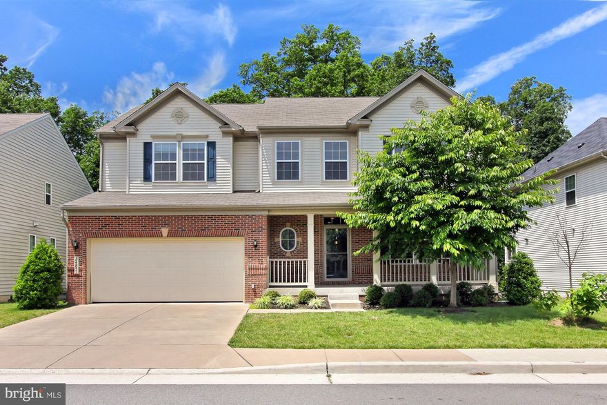 MOVE IN READY! This lovely 5 bedroom home has an East Facing Front with a desirable lot backing to trees. This home has been very well maintained and beautifully updated. Great entertaining space. Hardwood floors grace the main level. Entertain in the huge modern kitchen with a large island and breakfast bar, 42" maple cabinets, high-end silestone countertops and and tile backsplash. Kitchen opens into the family room with a cozy gas fireplace. The main level also features a bright sun-room right off the family room. Upstairs features a large Master bedroom with a luxury spa bath with a convenient upper level laundry and 3 additional bedrooms and a full bath. Finished lower level includes a fifth bedroom, full bath room and is prewired for your dream home theatre. Spacious yard with a fully functional irrigation system. Very close proximity to Route 50 and other major commuting routes.