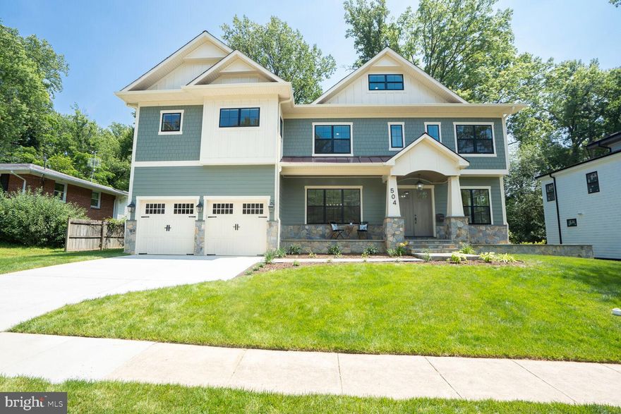 Welcome to 504 Kingsley Road SW, a stunning new construction masterpiece located in the heart of Vienna Woods. This seven-bedroom, six-and-a-half-bath custom home was designed and built in 2025 by the premier Architect and Builder RLN Development Group, showcasing timeless craftsmanship and thoughtful design throughout. From the moment you step through the grand double door entry, the soaring 10-foot ceilings, wide plank hardwood floors, elegant wainscoting, and custom crown molding make an unforgettable first impression.

The home features an open-concept layout that effortlessly blends function and style. A generously sized formal dining room—with space to comfortably host gatherings of 12 or more—flows seamlessly into a chef-inspired kitchen that truly defines “gourmet.” Outfitted with Wolf stainless steel appliances, a six-burner gas stove with a pot filler, quartz countertops, custom shaker cabinetry, and an expansive island with pendant lighting, this kitchen is the heart of the home. A Pinterest-worthy pantry and sophisticated butler’s pantry with wine fridge and glass cabinetry offer impressive storage and entertaining space.

The adjoining living room features a beautiful stone fireplace flanked by custom built-ins and a coffered ceiling with recessed lighting. French doors open to a spacious Trex deck that overlooks a flat, grassy yard—perfect for outdoor entertaining or quiet evenings at home. Just off the garage, the mud room offers built-in cubbies, shelving, and a utility sink that can double as a dog-washing station.

Upstairs, the luxurious primary suite offers hardwood floors, two enormous walk-in closets, and a tranquil sitting room. The spa-like primary bath features a soaking slipper tub, expansive quartz-topped dual vanity, and a massive walk-in shower with multiple shower heads and designer tile details. Each of the three additional bedrooms on this level boasts its own en suite bathroom and walk-in closet. A spacious laundry room with quartz counters, cabinet storage, and high-end washer and dryer adds convenience and elegance.

A rare second upper level/loft offers more than 1,200 square feet of additional living space, including two bedrooms, a full bath, and a flexible bonus room that can serve as a family room, home office, gym, art studio, play room, game room, or more. Meanwhile, the fully finished basement is an entertainer’s dream, complete with a large rec room, wet bar with wine fridge and dishwasher, a seventh bedroom, sixth full bath, and a true home theater with tiered flooring and plush carpeting.

Outside, the 0.25-acre lot is beautifully landscaped with a charming covered front porch, arched portico, and spacious Trex deck. The home also features two EV charger ports in the oversized garage, Cat6 Ethernet wiring throughout, and dual-zone HVAC systems for year-round comfort.

Location is everything, and this home delivers. Minutes to downtown Vienna, the Vienna Metro (Orange Line), and major commuter routes including I-66, I-495, and the Dulles Access Road. Enjoy easy access to Tysons Corner, The Boro, Mosaic District, Westwood Country Club, and Wolf Trap. Nearby grocery stores include Giant, Whole Foods, and The Fresh Market, while Vienna’s vibrant restaurant scene features beloved favorites such as The Vienna Inn, Clarity, Bonaroti, Café Renaissance, and Carnegie Diner.

This home combines exceptional craftsmanship and square footage with one of the most compelling price points in the neighborhood. Here is a rare chance to own a high-end, custom-built home in Vienna at a price that stands out among recent comps. When compared to other recent new builds nearby, the value here is undeniable—premium finishes and thoughtful design at a smart price.

504 Kingsley Road SW is more than just a home—it’s a rare opportunity to own a custom-built residence in one of Northern Virginia’s most sought-after communities, at a value that’s hard to beat.
