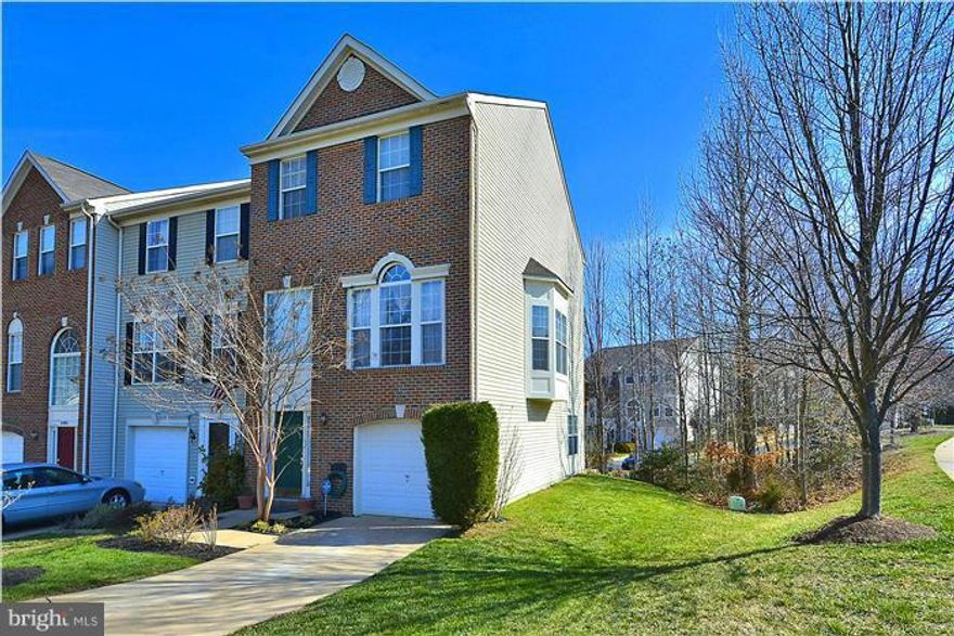 Beautiful Move-In Ready Brick Front End Unit TH with a 1 Car Garage. Features Include: 3 BRs, 3 Baths, Family Rm FP, Full Bathroom on Main Level, Extended Concrete Driveway, 2 Story Foyer & more.  Home has fresh interior paint . Master Suite offers additional room for a sitting area as well as vaulted ceilings.  There is nothing to do here but bring your furniture and move in. Call for alarm code!