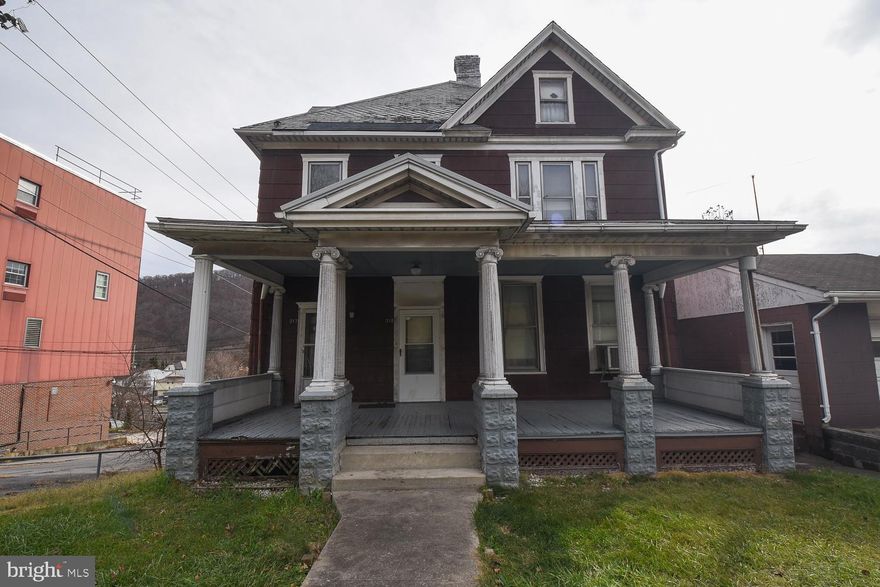 If you're looking for something one-of-a-kind, you've found it here! The opportunities presented by this oversized traditional home are limitless.  Currently used as a large single family residence, this property was once set up to be utilized as two units and could easily be converted back to a multi-unit property with one unit on the ground level and one unit on the second level.  The property features a HUGE basement and attic, giving you truly 4 floors of usable space.  Parking is expanded and highlighted by a detached 1 car garage with an additional off-street parking space in front of it.