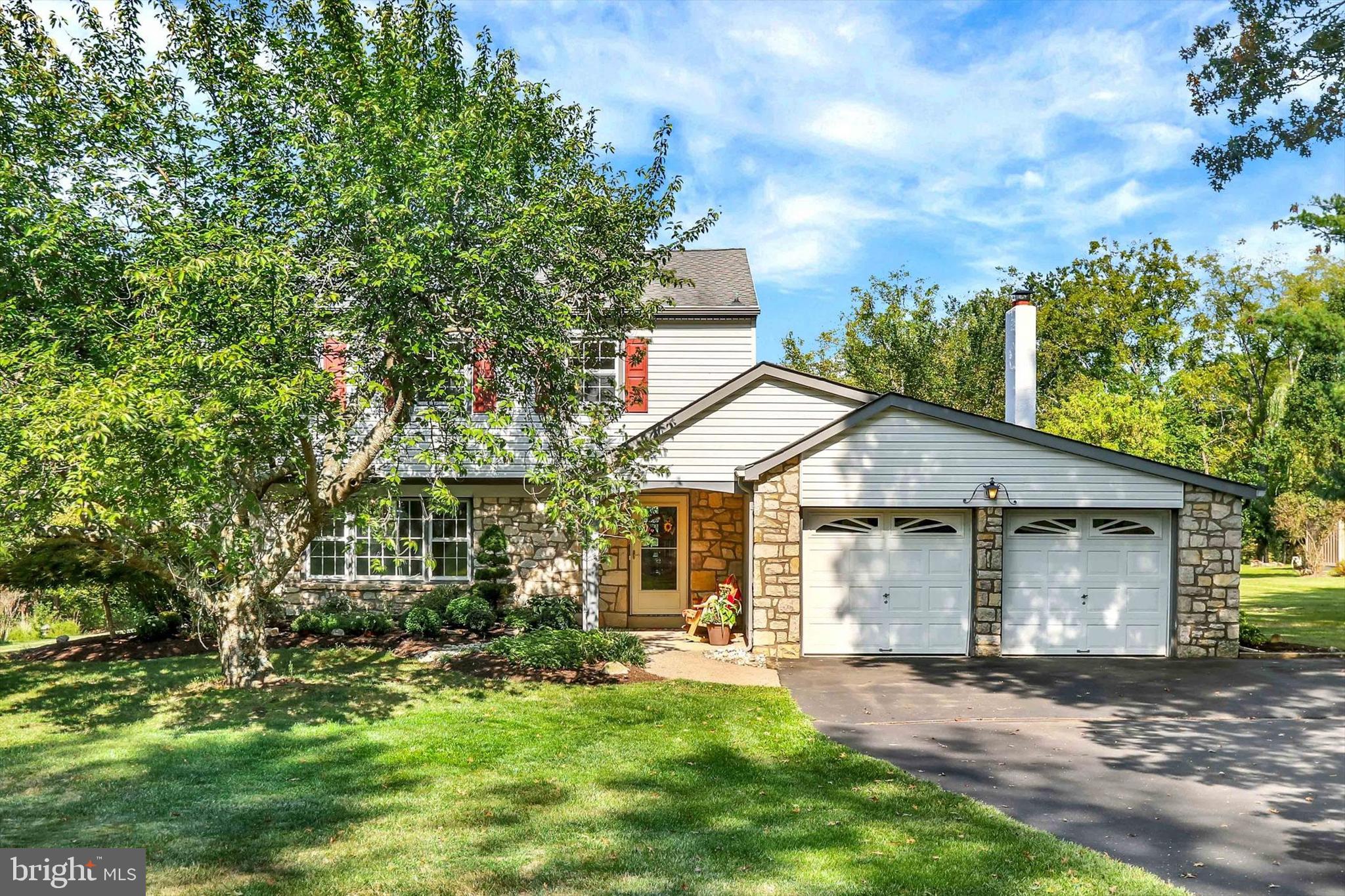 This traditional style home offers a unique sense of community and belonging with the neighboring homes. Centrally located in Central Bucks School District and a few miles from Doylestown Borough. This charming home hosts eight rooms including a spacious kitchen with stainless steel appliances, maple colored cabinets, tile back-splash, a large breakfast area and views of the open and secluded back yard. Open to the kitchen is the sunken family room that showcases a handsome stone fireplace that is sure to be the centerpiece of the home. Glass french doors take you out to the over sized deck that is perfect for additional entertaining and lounging. The formal living room and dining room have an open floor plan with chair rail molding, neutral carpeting, picturesque windows and plenty of natural light. A half bath/;powder room and laundry room with upper cabinets and a utility sink completes the main level of the home. Leading up the stairs to the upper level, you will find three secondary bedroom all generous in size with ample closet space, ceiling fans, recently refinished hardwood flooring, a linen closet and a shared hall bath. The primary bedroom offers large closets, recently refinished hardwood flooring and a private bath. The outside of the home offers a large deck, opens views, mature landscaping beds and trees, and a two car garage.
