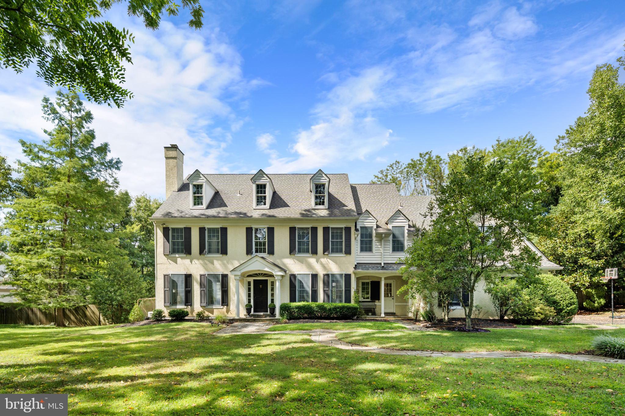 Welcome to this beautiful, Pohlig built, center hall, colonial situated on a well-manicured lot in sought after Radnor Township. This light filled stunner has been impeccably maintained and offers something for everyone. Upon entering the front door, you are greeted by gleaming hardwood floors, a sweeping staircase to the second floor, high ceilings, and sundrenched rooms. The first floor features a large family room with cathedral ceiling open to the spacious kitchen with breakfast room, work area, and several accesses to the oversized deck overlooking the private yard and pool area, making for seamless indoor/outdoor entertaining. Just off the kitchen is the formal dining room, home office/study with built-ins, formal living room with wood burning fireplace, 2 powder rooms, mud room, laundry, and access to 3-car garage. Upstairs you will find the sun filled primary bedroom with his and hers walk-in closets and attached marble bath with glass shower and soaking tub. There are 4 additional bedrooms with generous closet space in each, 2 full baths, and a bonus room. The lower level is currently used as an informal gym/game room for adults and children and has plenty of storage space and high ceilings. Outside you will find an expansive deck, mature landscaping, completely fenced in yard with private pool. Updates include newer windows, house generator, new water heater, HVAC, and septic. This serene property is steps away from Chanticleer Gardens, ensuring your views and privacy for years to come. Not only is this home a true gem, it is also located in the award winning Radnor School District, only a few blocks from Radnor Trails, minutes to downtown Wayne’s shops and restaurants, close to the many prestigious private and public schools in the area, and everything else that life on the Main Line has to offer.