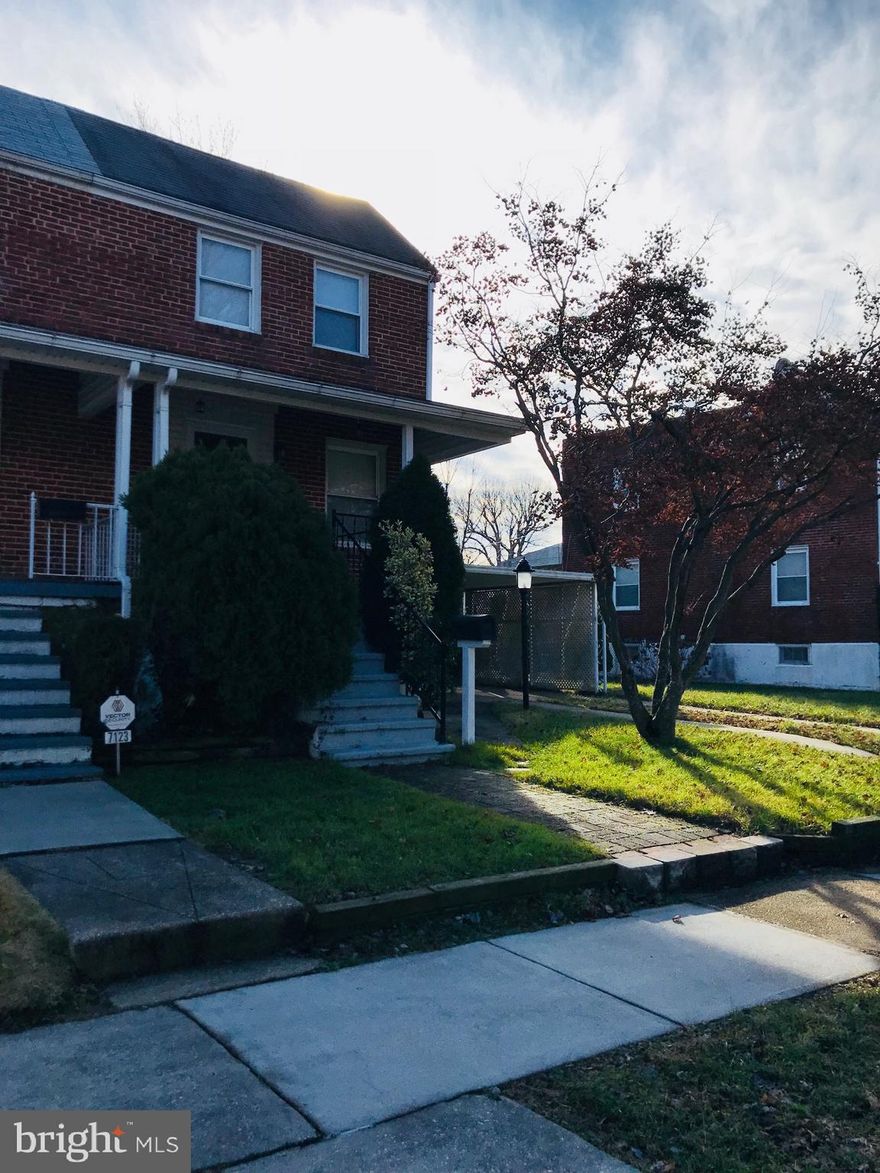 Great 2 bedroom 1.5 bath brick duplex with hardwood floors throughout, recently updated kitchen, bathrooms and  finished basement, covered front and rear entry porches with fully fenced rear yard,  great location.. quick access to 695, school and shopping. Shed sold as is.